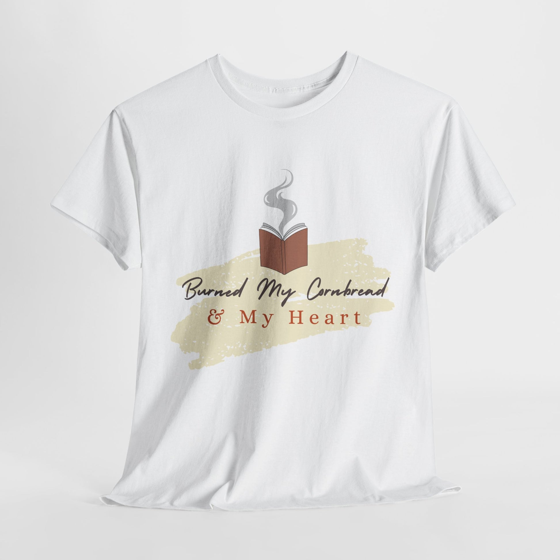 White t-shirt with stubborn charm - smoking book, beige smear and text 'Burned My Cornbread & My Heart'