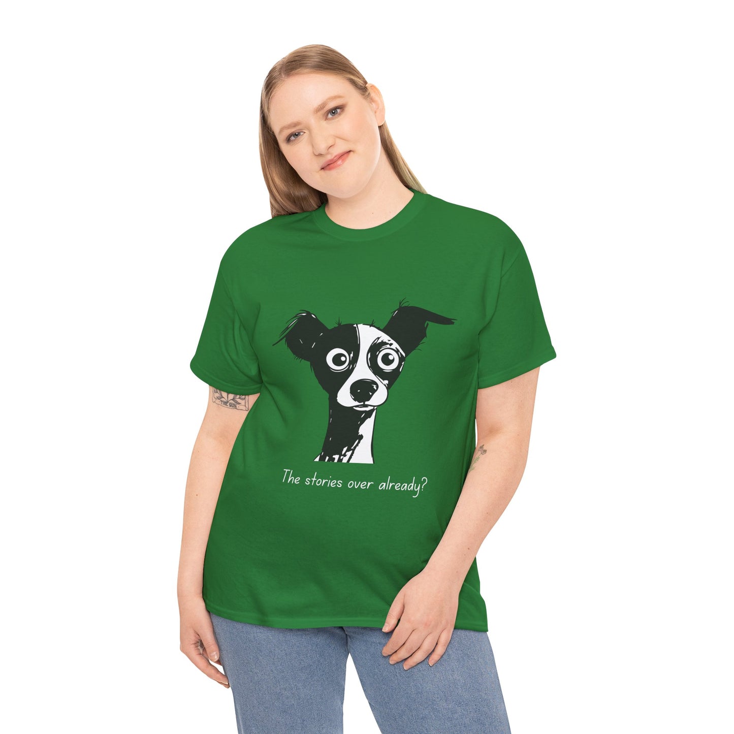 Woman wearing a green t-shirt with a black and white puzzled dog and text 'The stories over already?'