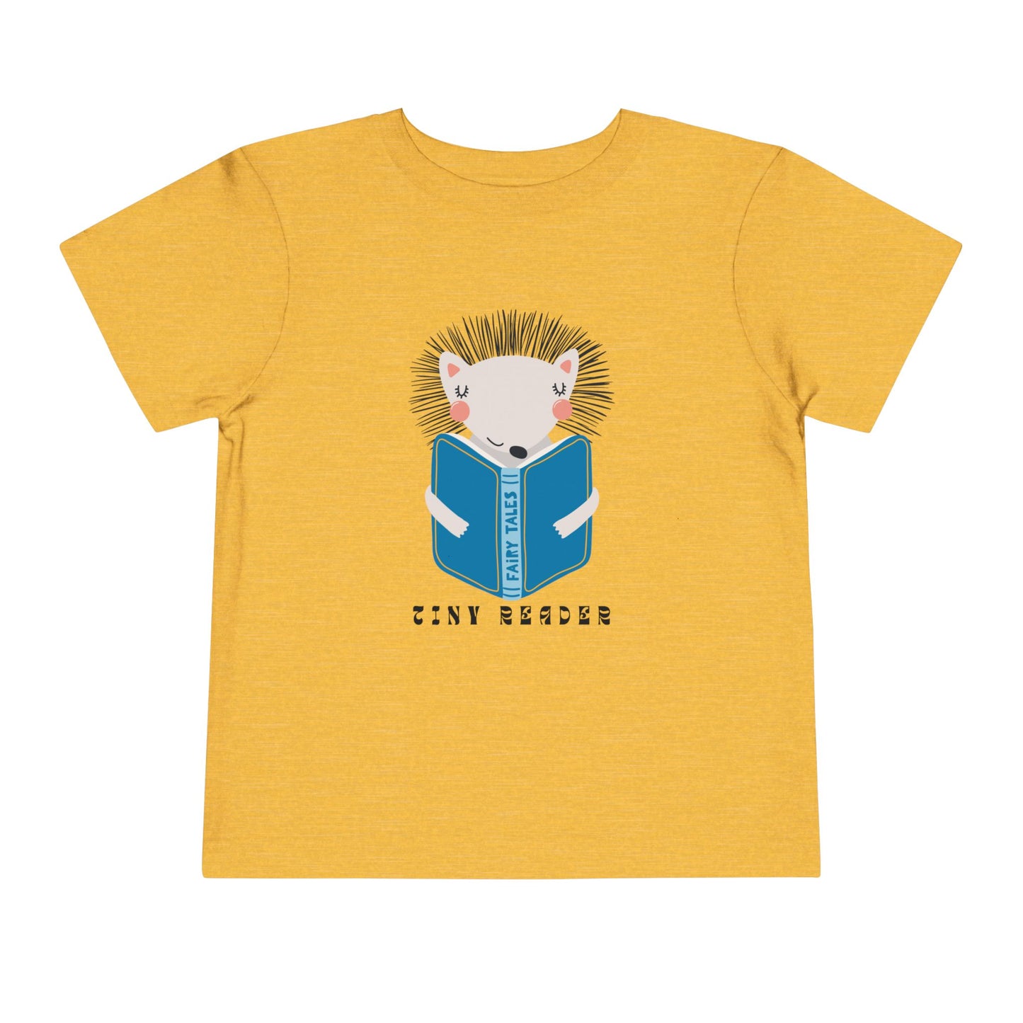Yellow t-shirt with a hedgehog reading a book graphic and 'Tiny Reader' text