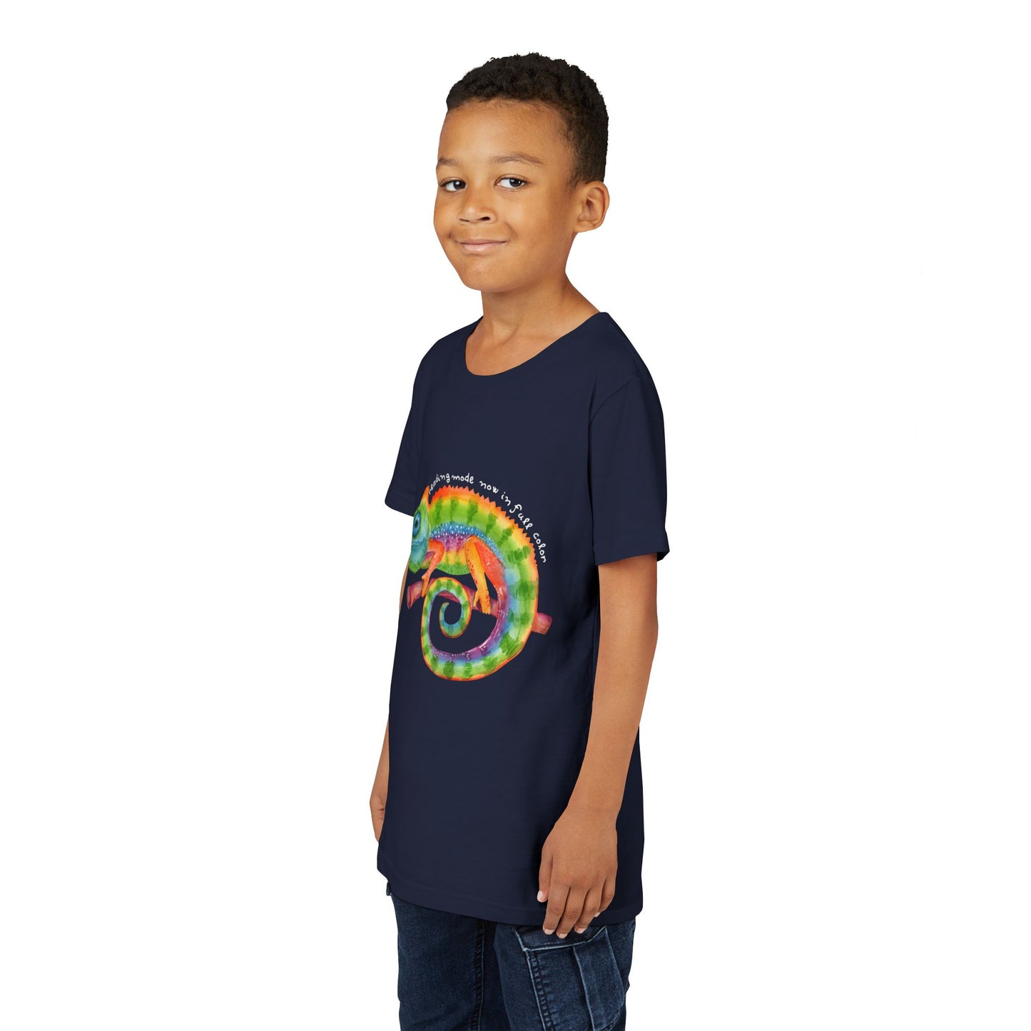 Boy wearing a navy blue t-shirt with a colorful chameleon and text 'reading mode now in full color'