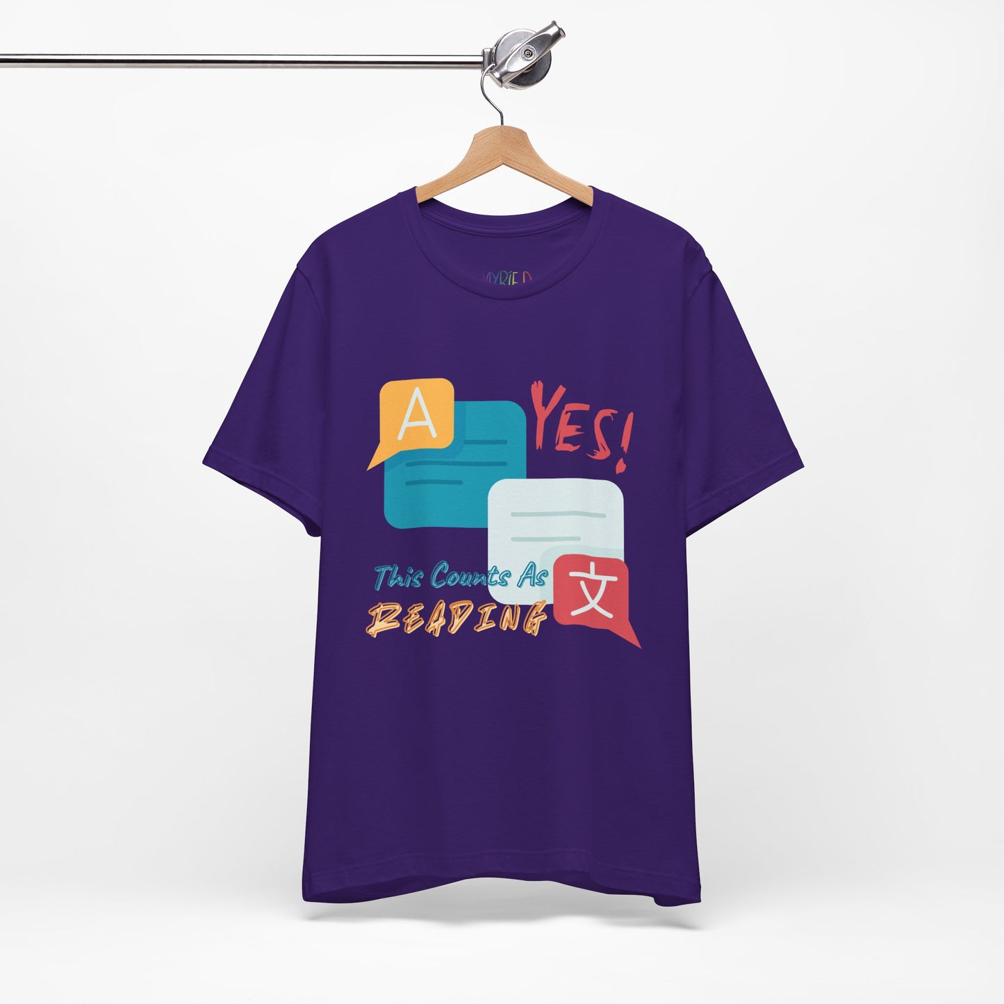 Purple t-shirt with colorful instant messaging boxes and text 'YES! This Counts As Reading'