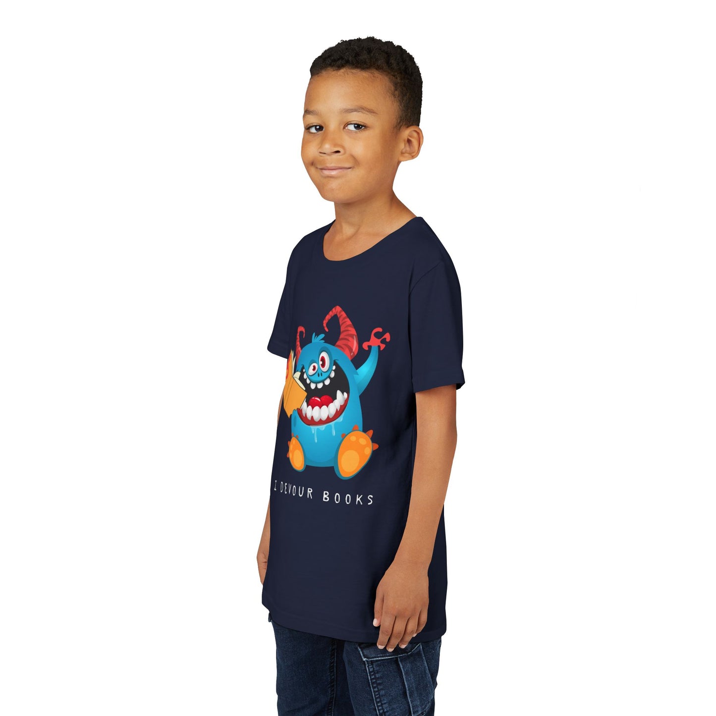 Boy wearing a navy blue t-shirt with a wide mouthed, book chomping cartoon monster and text 'I DEVOUR BOOKS' 