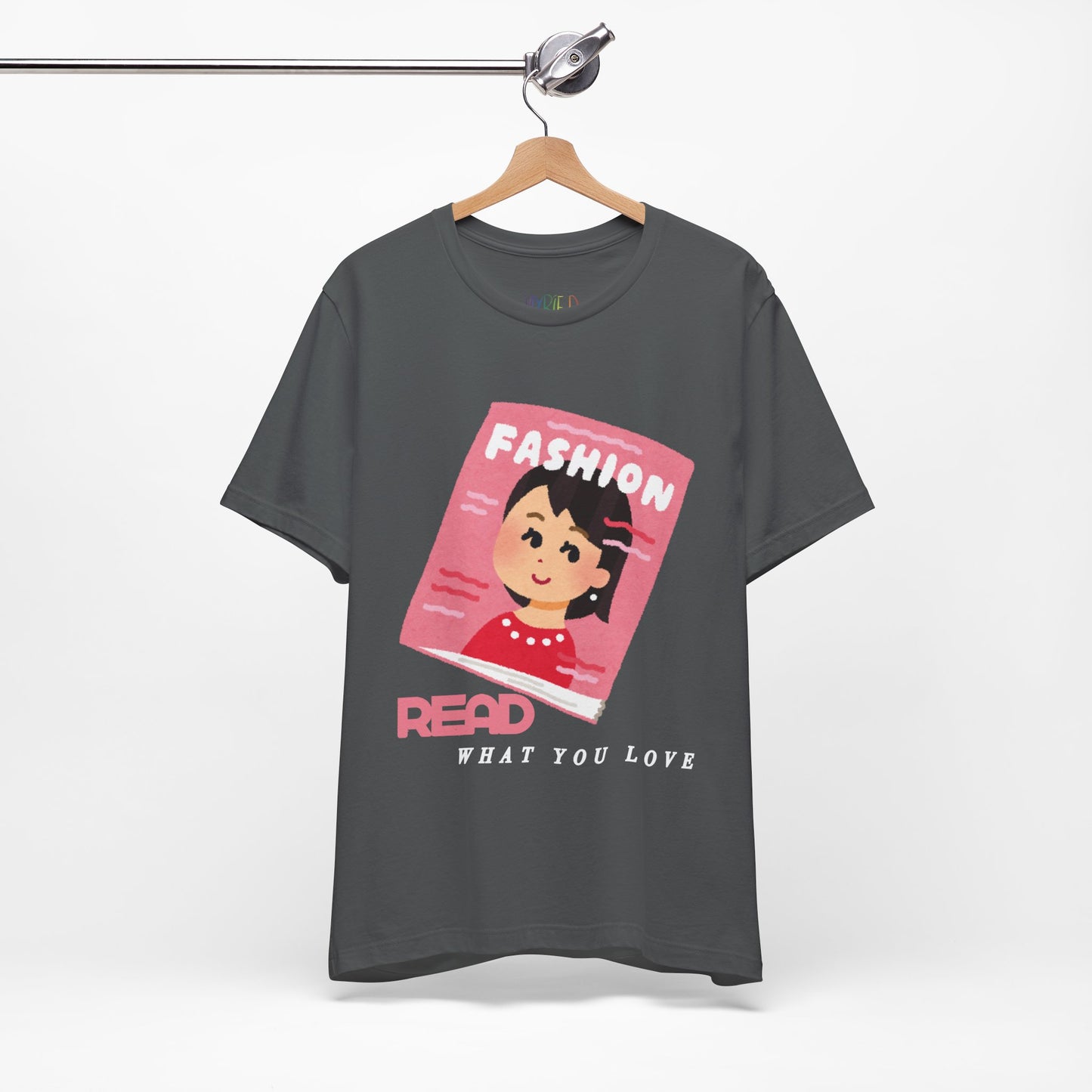 Gray t-shirt with a graphic design of a girl on a fashion magazine and text 'Read What You Love' 