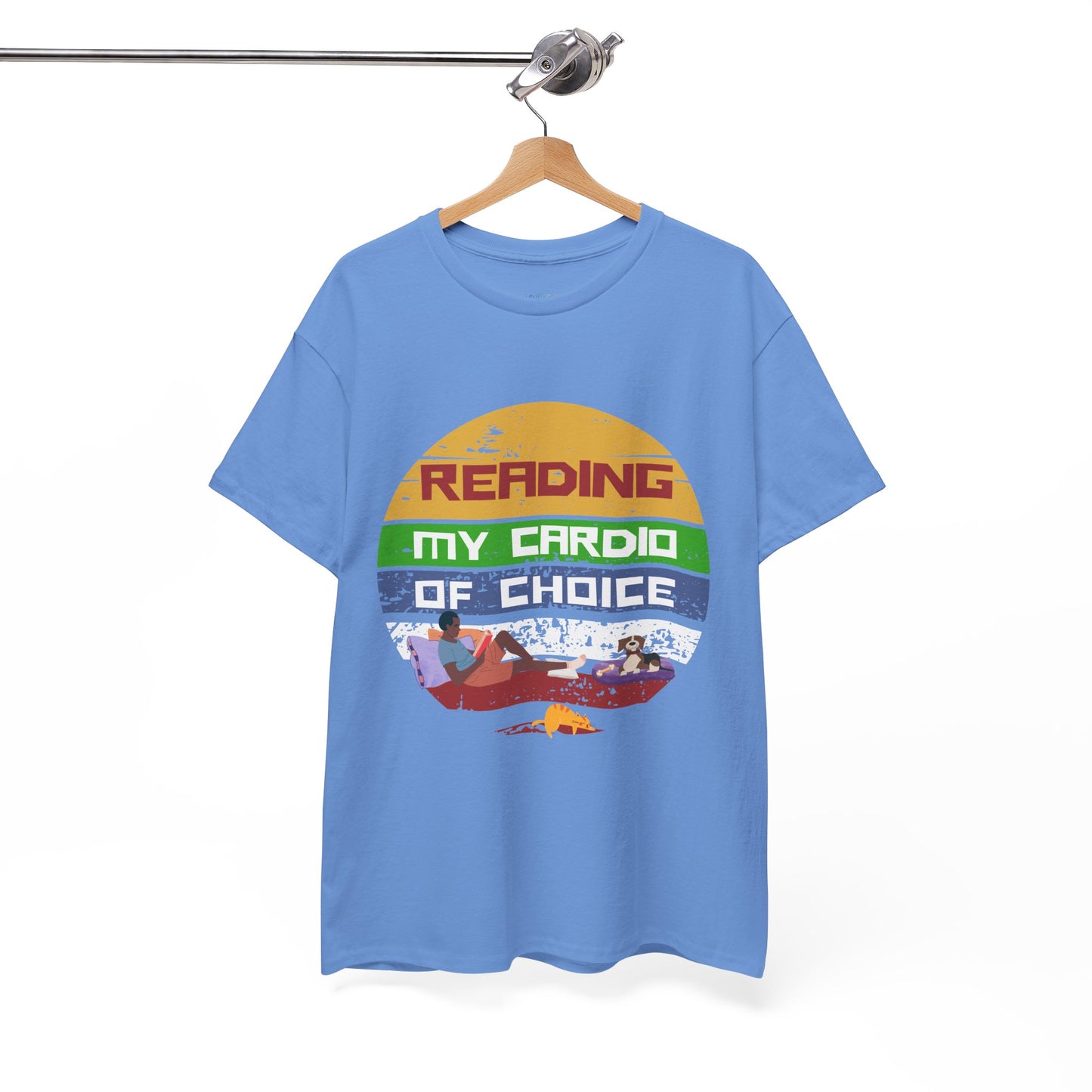 Blue retro t-shirt with a colorful striped circle featuring a man reading a book alongside his dog and cat, and text 'Reading, My Cardio Of Choice' 