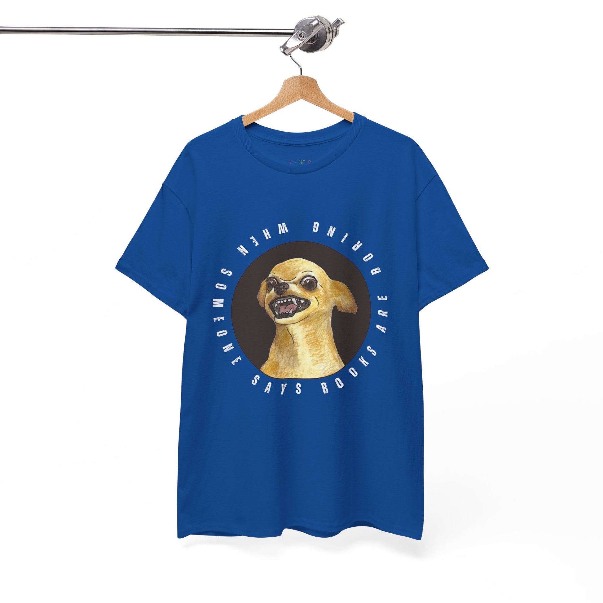 Blue t-shirt with a graphic of a fierce chihuahua dog, circled by text 'When Someone Says Books Are Boring' 