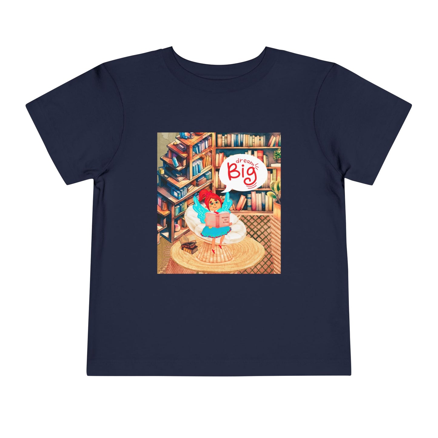 Navy t-shirt with a colorful library graphic of a fairy reading a book and thought bubble text 'Dream Big'