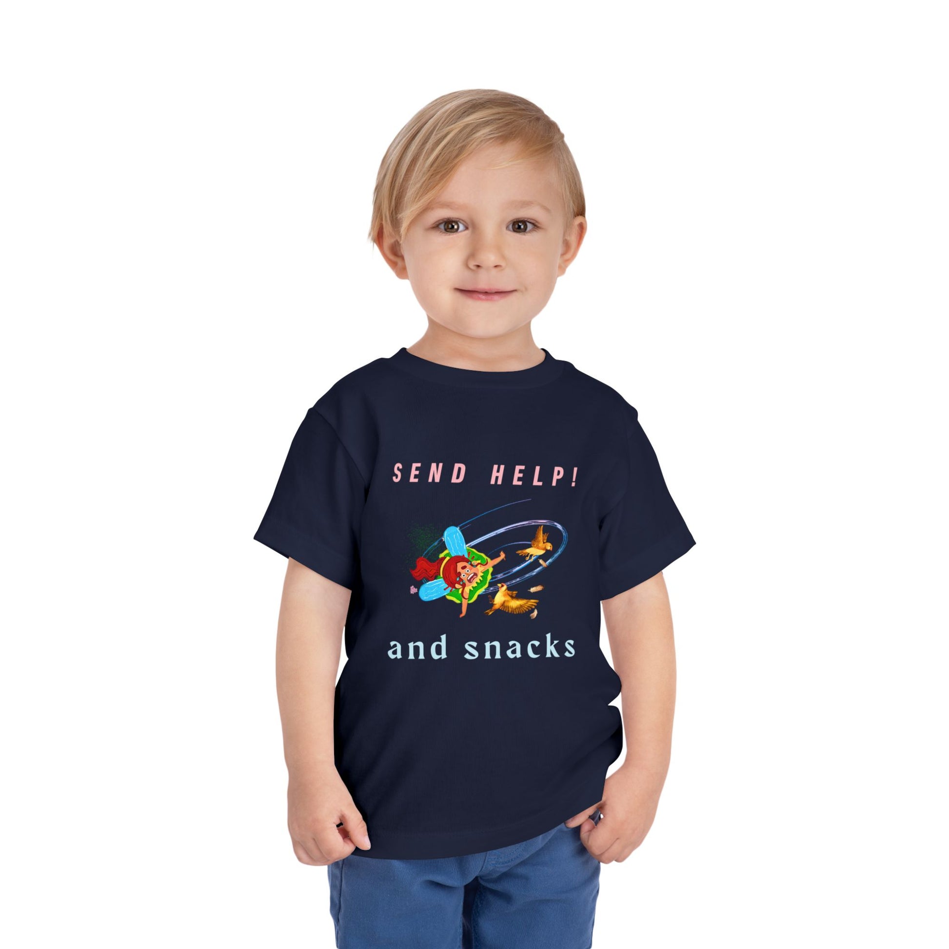 Child wearing a navy blue toddler t-shirt with a cartoon fairy colliding into birds mid-air and text 'Send Help! and snacks'