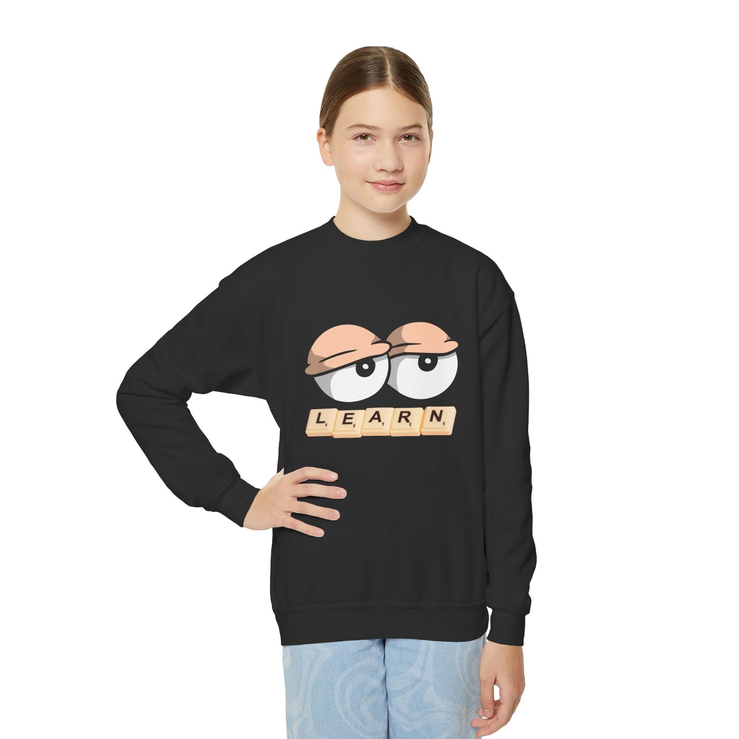 Girl wearing a black sweatshirt with droopy cartoon eyes and 'LEARN' game tile text 
