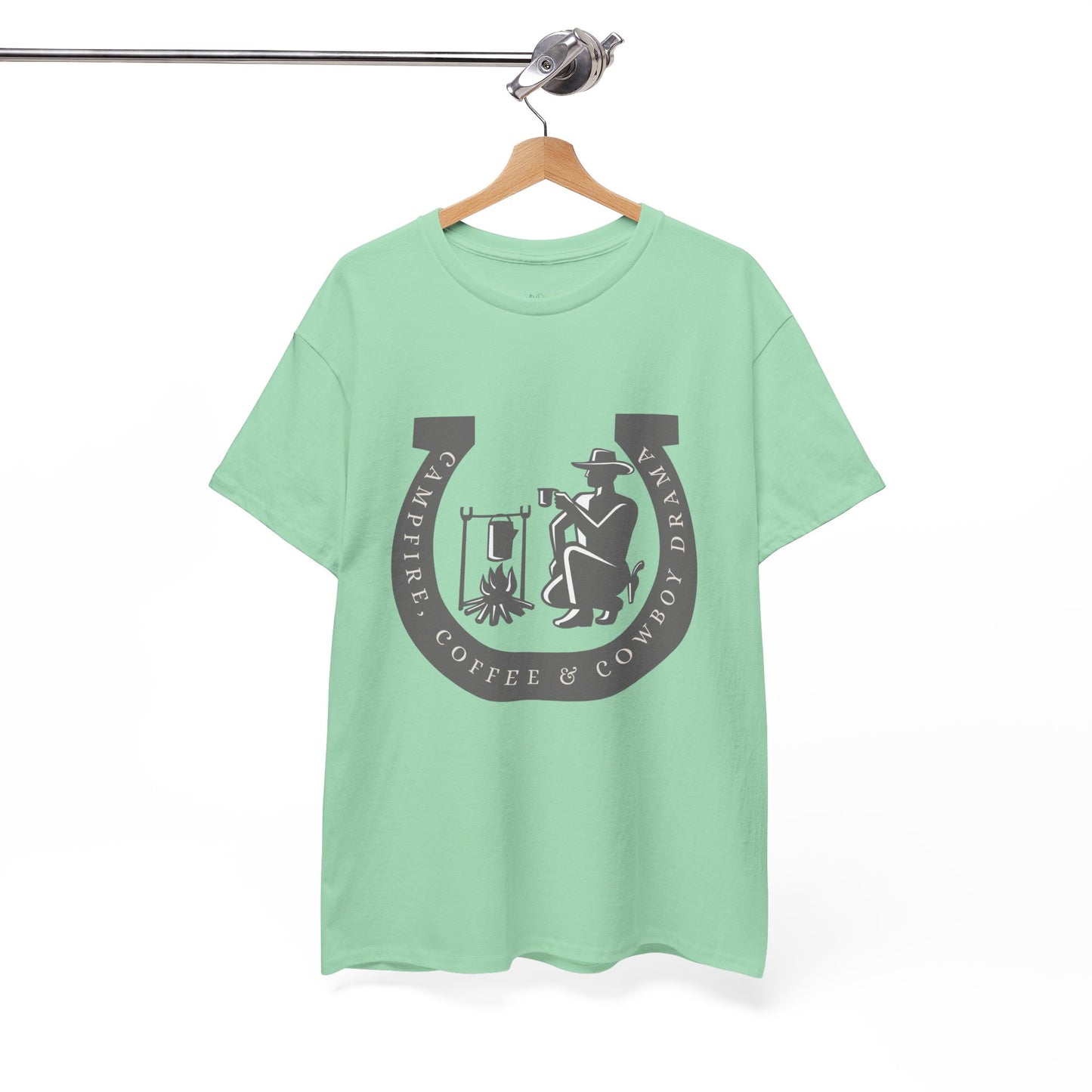 Green t-shirt with a large gray horseshoe graphic around a cowboy campfire and text 'Campfire, Coffee & Cowboy Drama'
