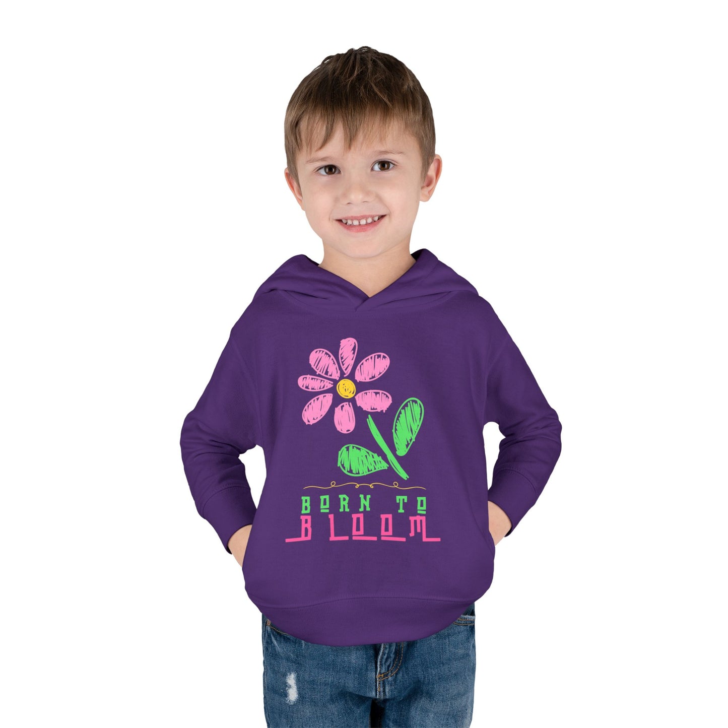 Boy wearing a purple toddler hoodie with a sketched flower and text 'born to bloom'
