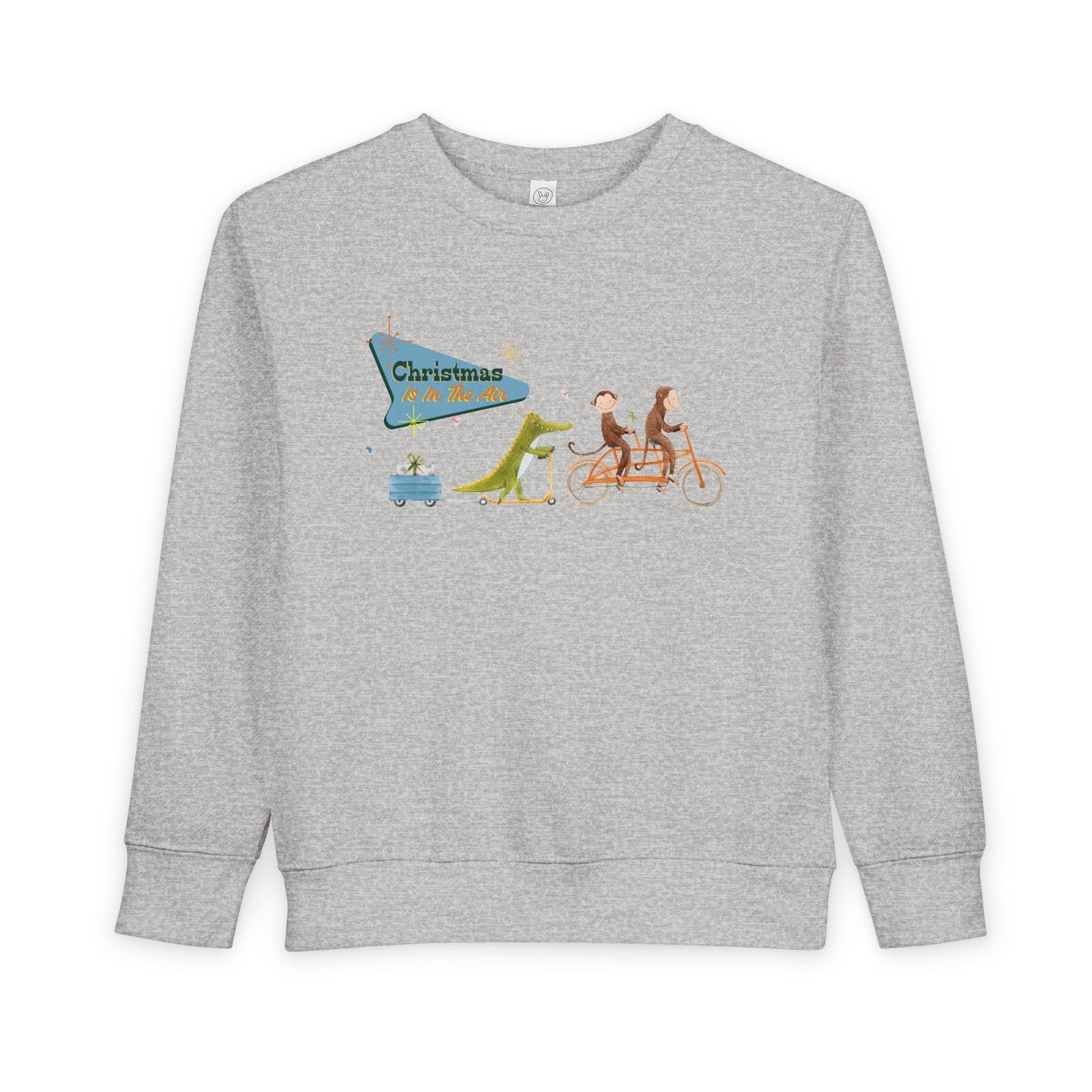 Gray toddler sweatshirt with a graphic design of two monkeys riding a tandem bike, followed by a crocodile on a scooter pulling a trailer with a present, text 'Christmas Is In The Air' 