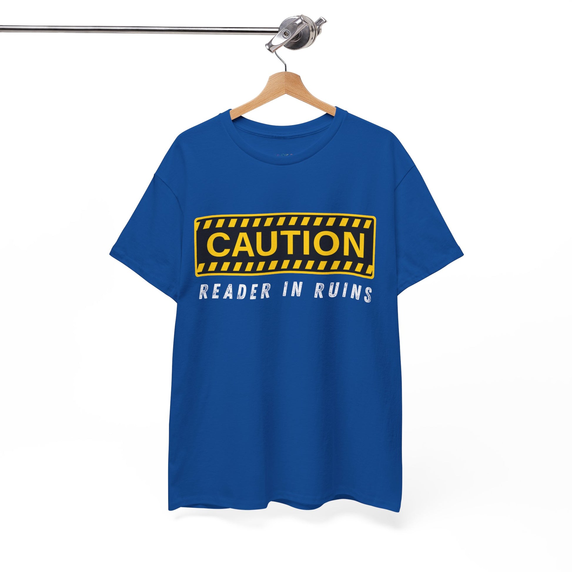Blue t-shirt with yellow and black 'Caution' graphic and text beneath ' Reader In Ruins'