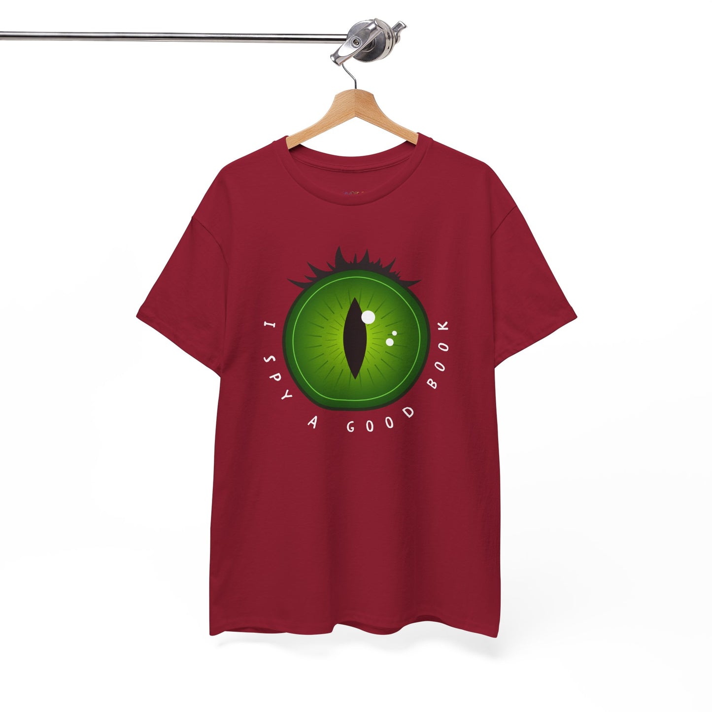 Red t-shirt with a green eye design and text 'I Spy A Good Book' on a hanger against a white background