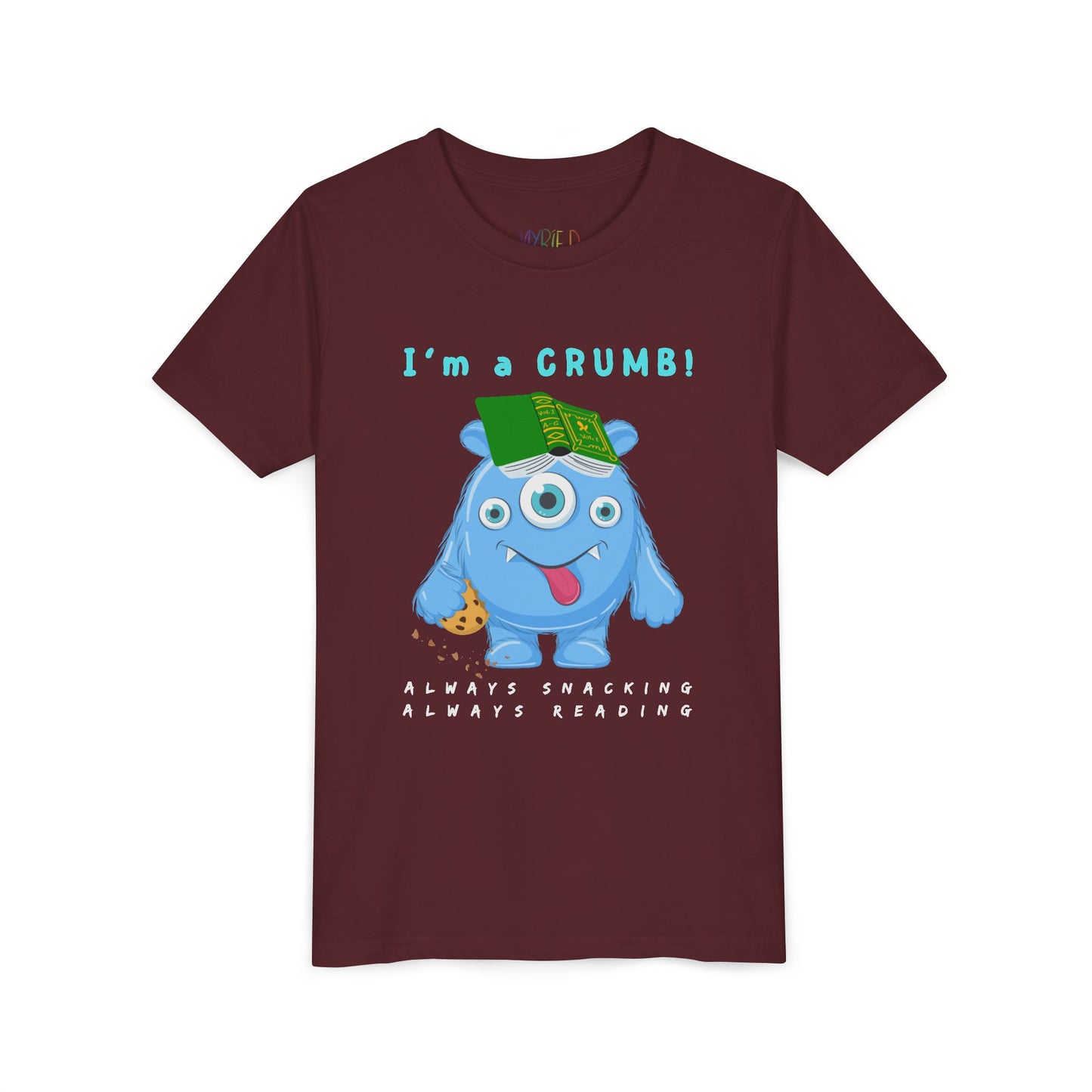 Maroon t-shirt with a cartoon blue monster holding a book and text 'I'm a CRUMB!'
