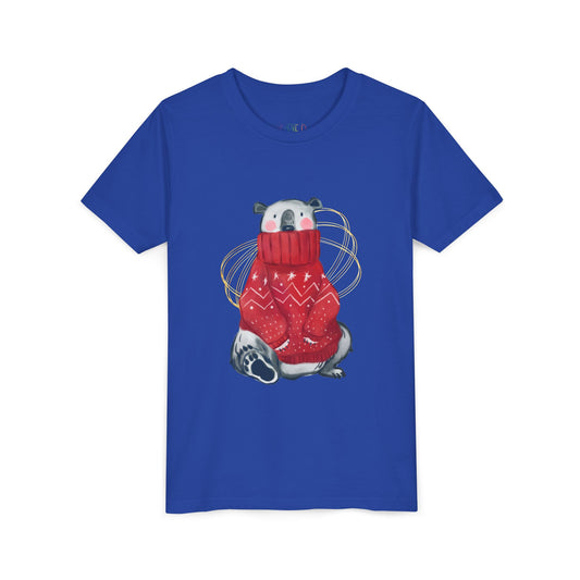 Blue t-shirt with a graphic of a polar bear in a red sweater on a white background