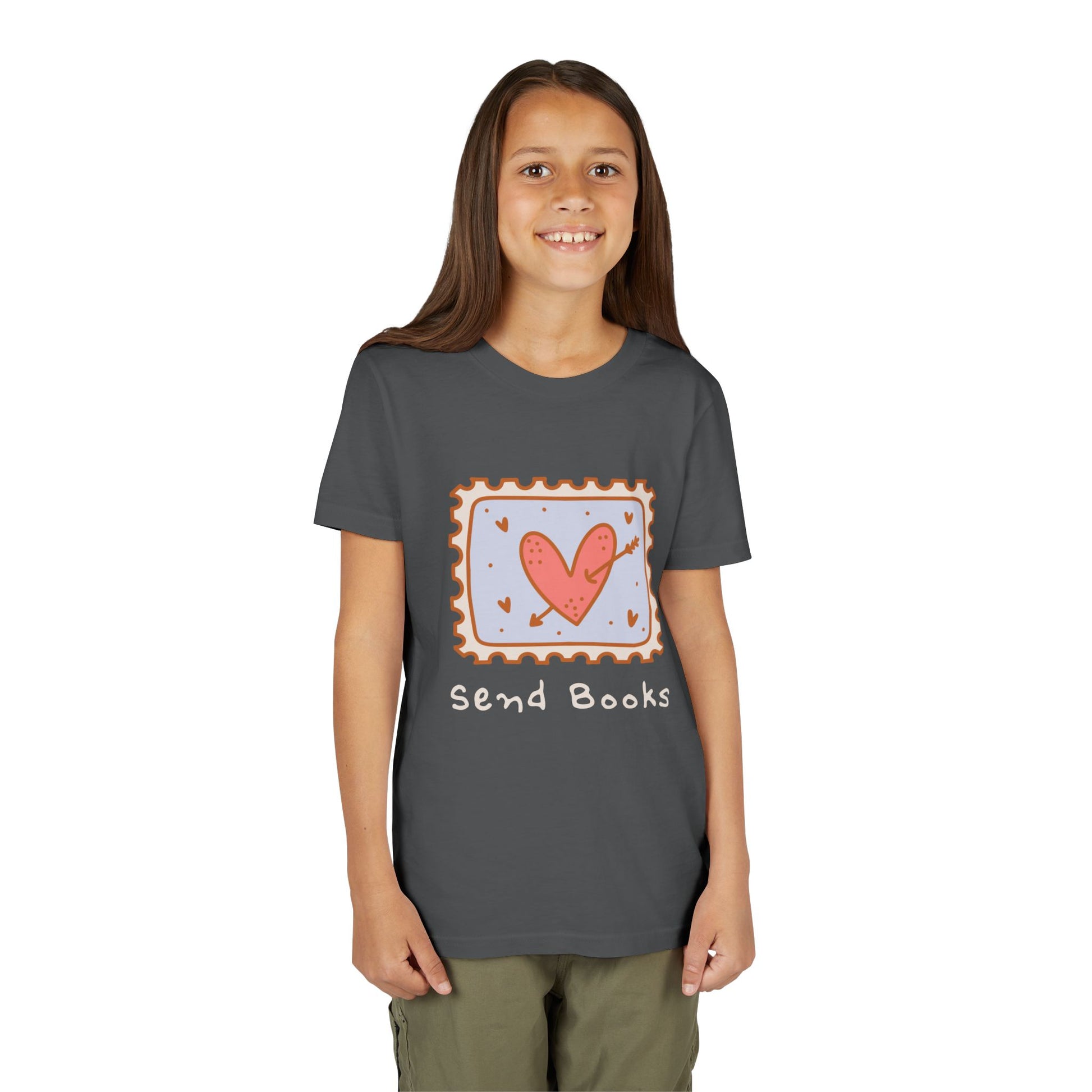 Girl wearing a dark gray t-shirt with a heart stamp and text 'Send Books'