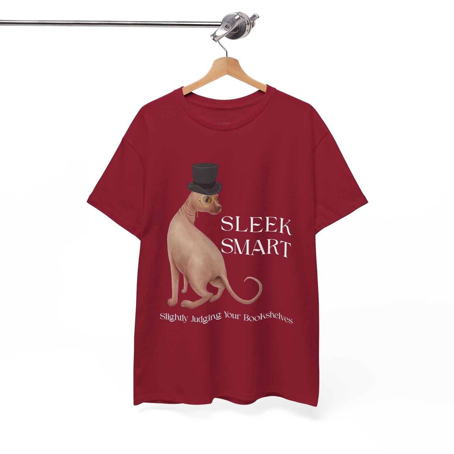 Red t-shirt with a hairless cat in a monacle and top hat, text "SLEEK SMART' and 'Slightly Judging Your Bookshelf'