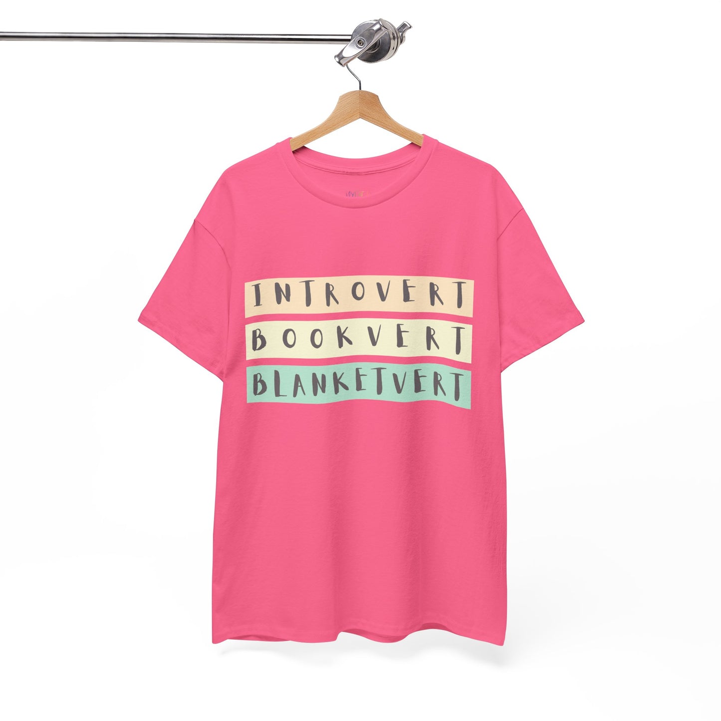 Pink t-shirt with soft colorful text 'Introvert. Bookvert. Blanketvert.'