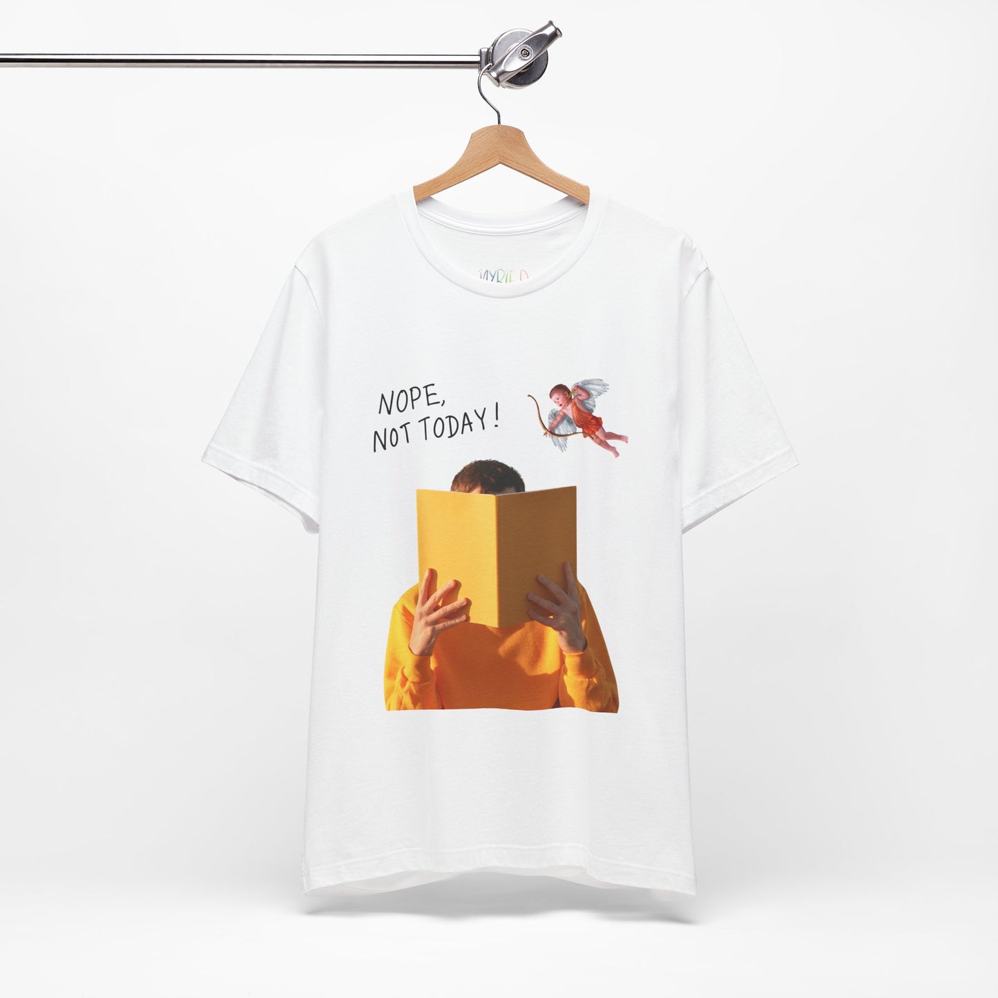 White t-shirt with graphic design of person holding a book in front of their face while cupid is hovering above and text 'NOPE, NOT TODAY!' 