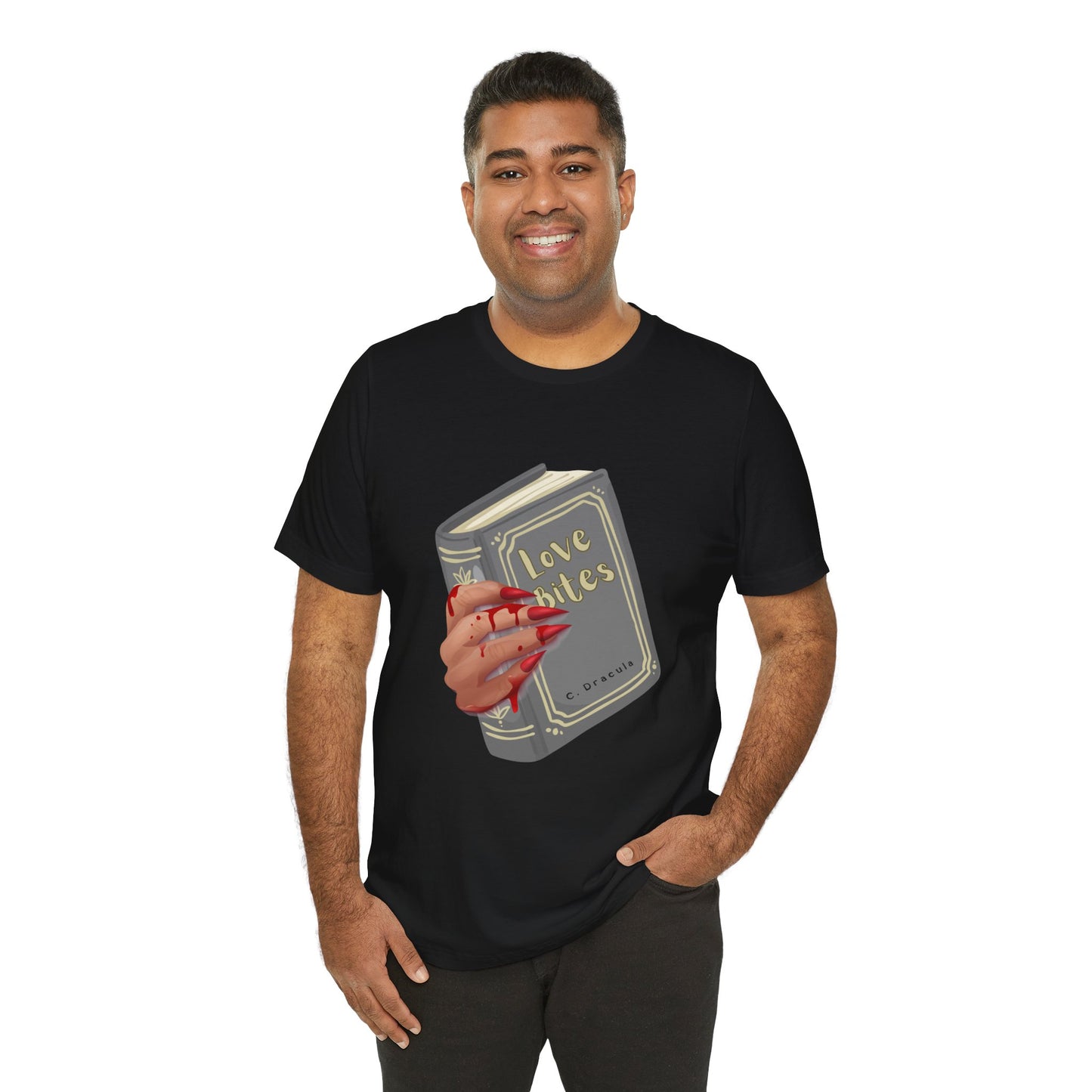 Man wearing a black t-shirt with graphic design of a creepy and bloody hand holding a book titled 'Love Bites' by C. Dracula