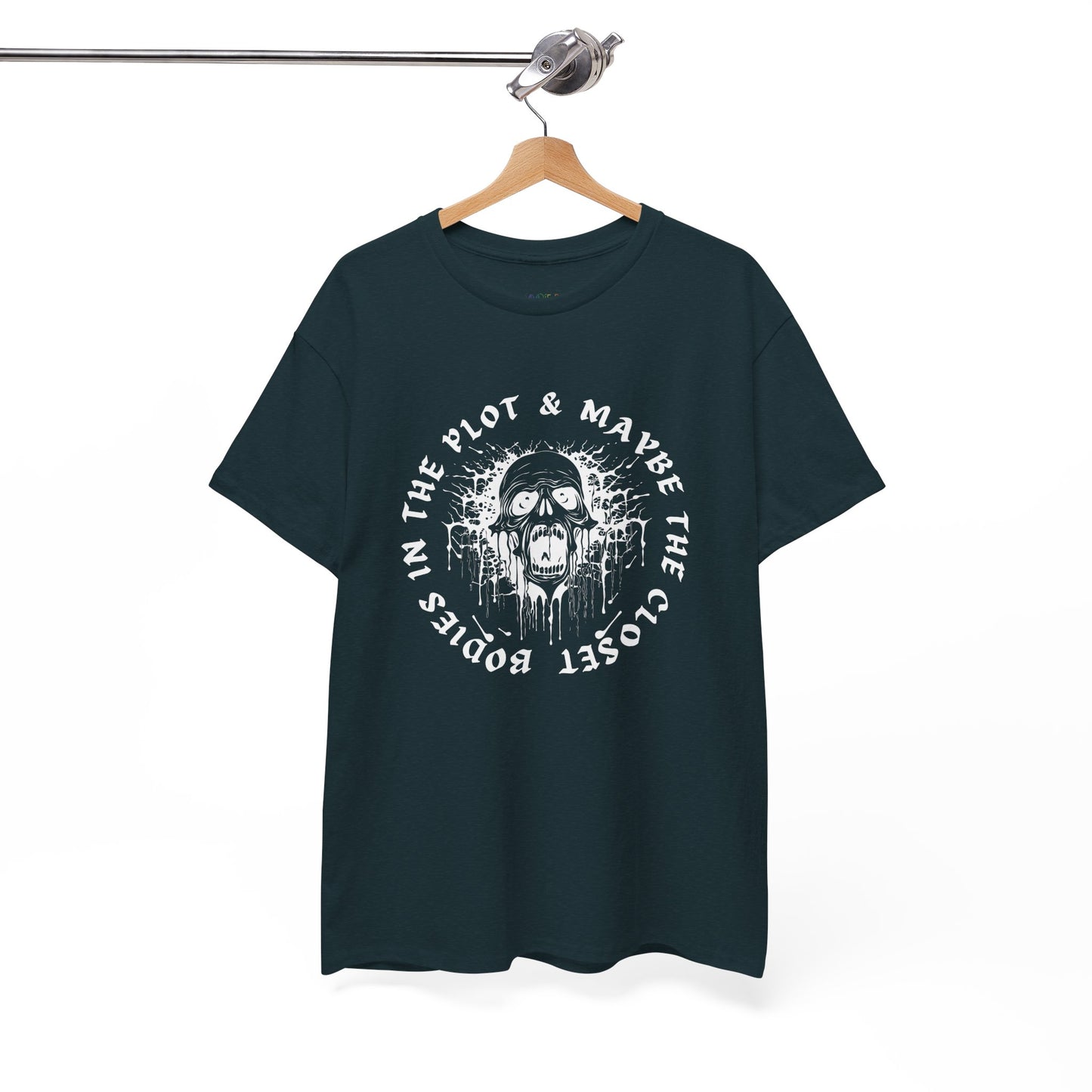 Midnight t-shirt with graphic of a screaming skull and text 'Bodies In The Plot & Maybe The Closet' on a hanger against a white background