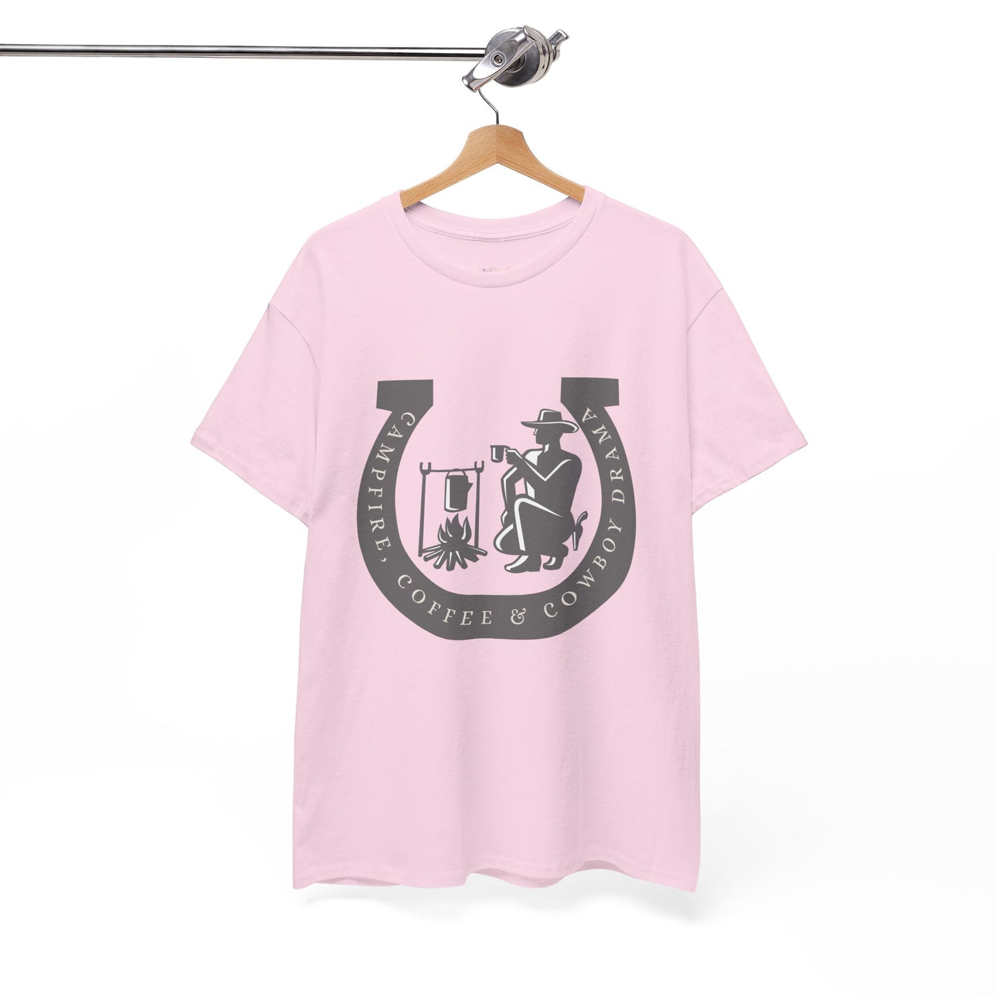 Pink t-shirt with a large gray horseshoe graphic around a cowboy campfire and text 'Campfire, Coffee & Cowboy Drama'