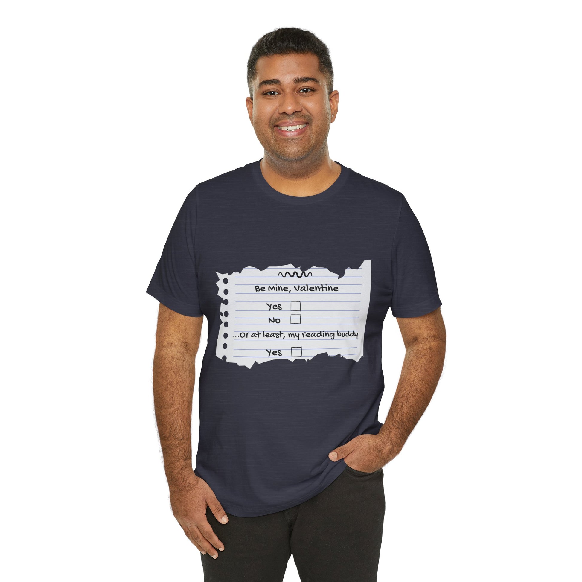 Man wearing a navy blue t-shirt with an image of torn notebook paper and old school checkboxes depicting 'Be Mine Valentine, Yes, No' and 'Or At Least , My Reading Buddy, Yes'