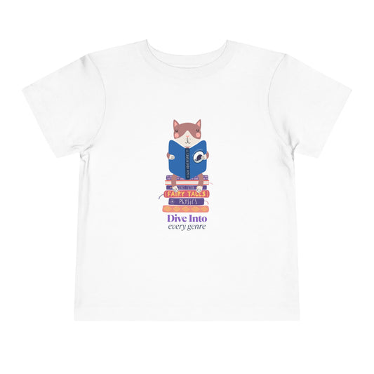 White toddler t-shirt with a cat reading a book while sitting on a stack of books and text 'Dive Into Every Genre'