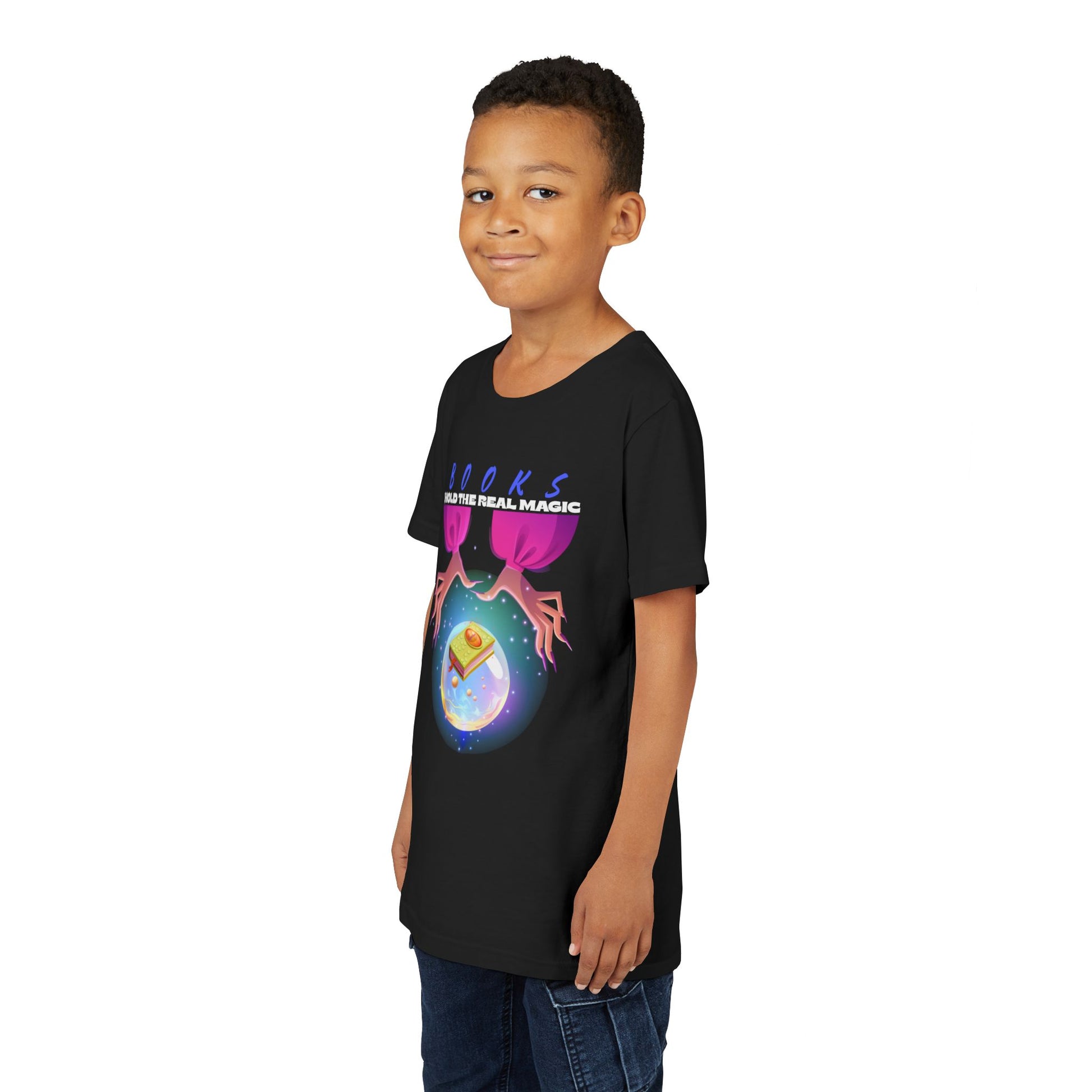 Boy wearing a black t-shirt with a hands around a crystal ball featuring a monster book and text 'Book Hold The Real Magic'