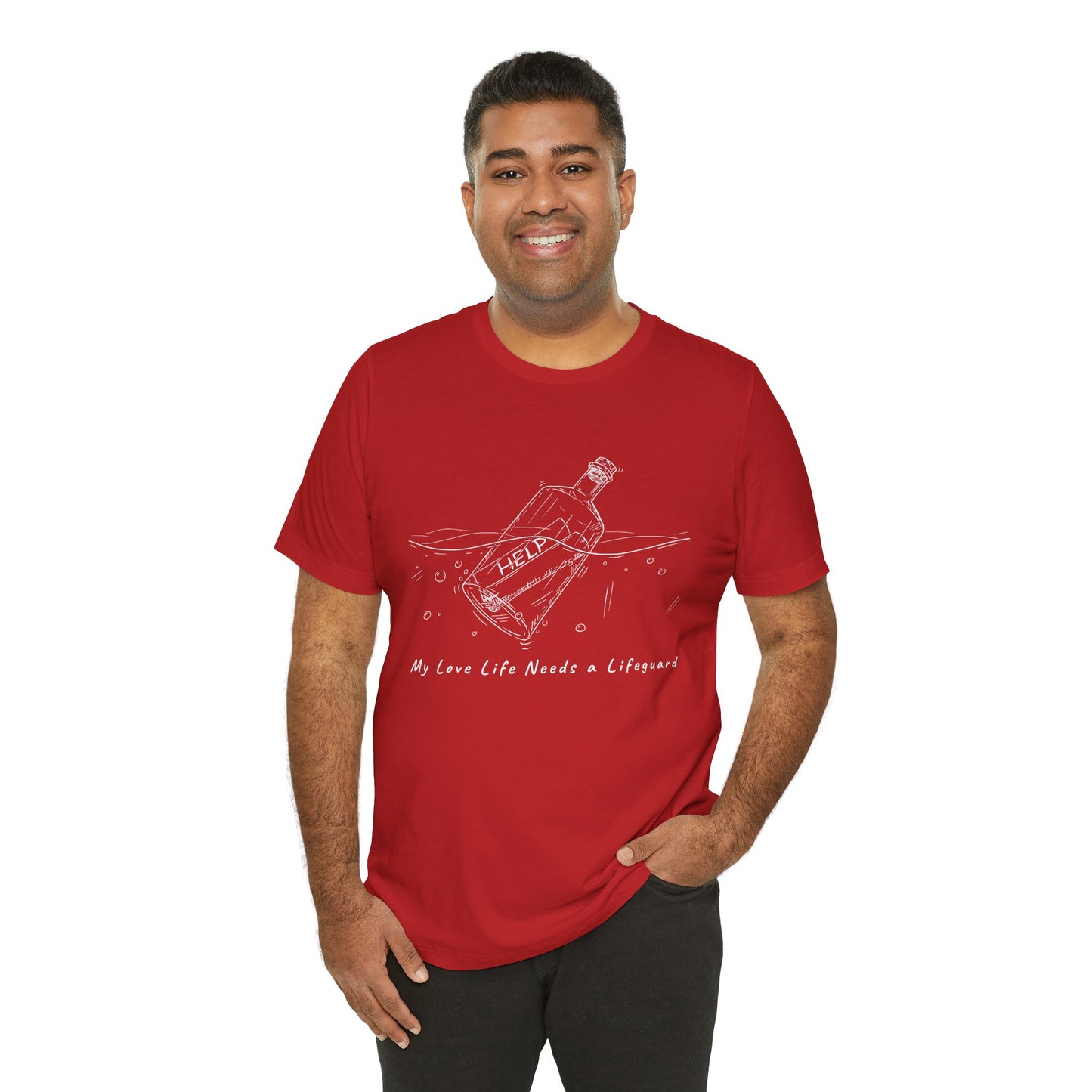 Man wearing a red t-shirt with white sketched image of a bottle floating in water with a rolled up paper inside that says 'help' and text below 'My Love Life Needs a Lifeguard'
