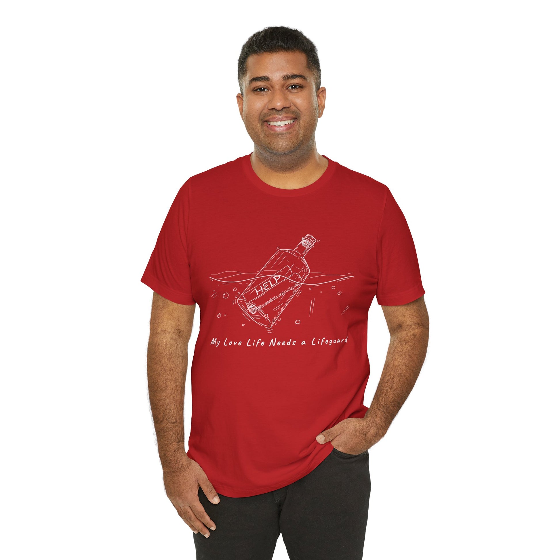 Man wearing a red t-shirt with white sketched image of a bottle floating in water with a rolled up paper inside that says 'help' and text below 'My Love Life Needs a Lifeguard'