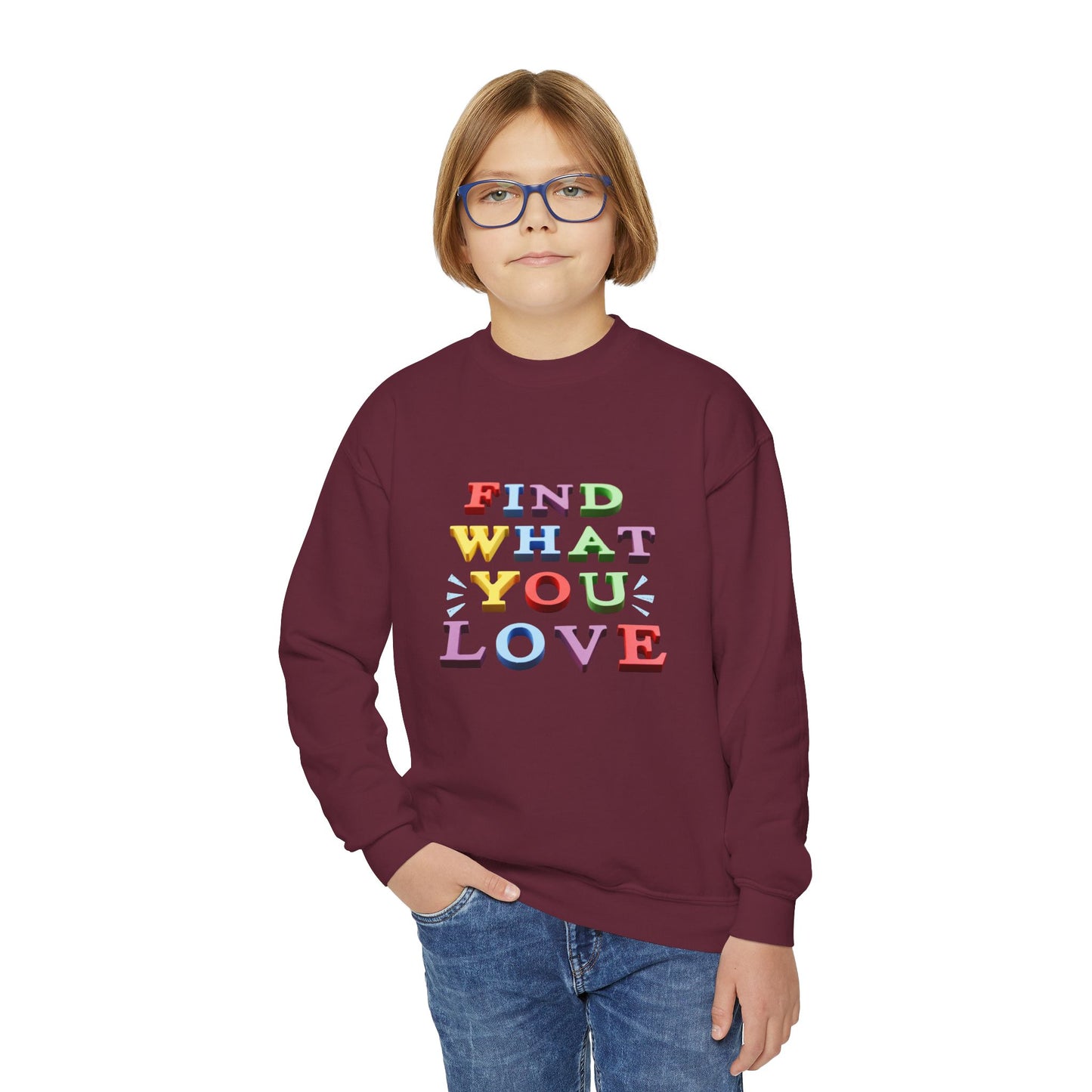 Boy wearing a maroon sweatshirt with colorful text 'Find What You Love' 