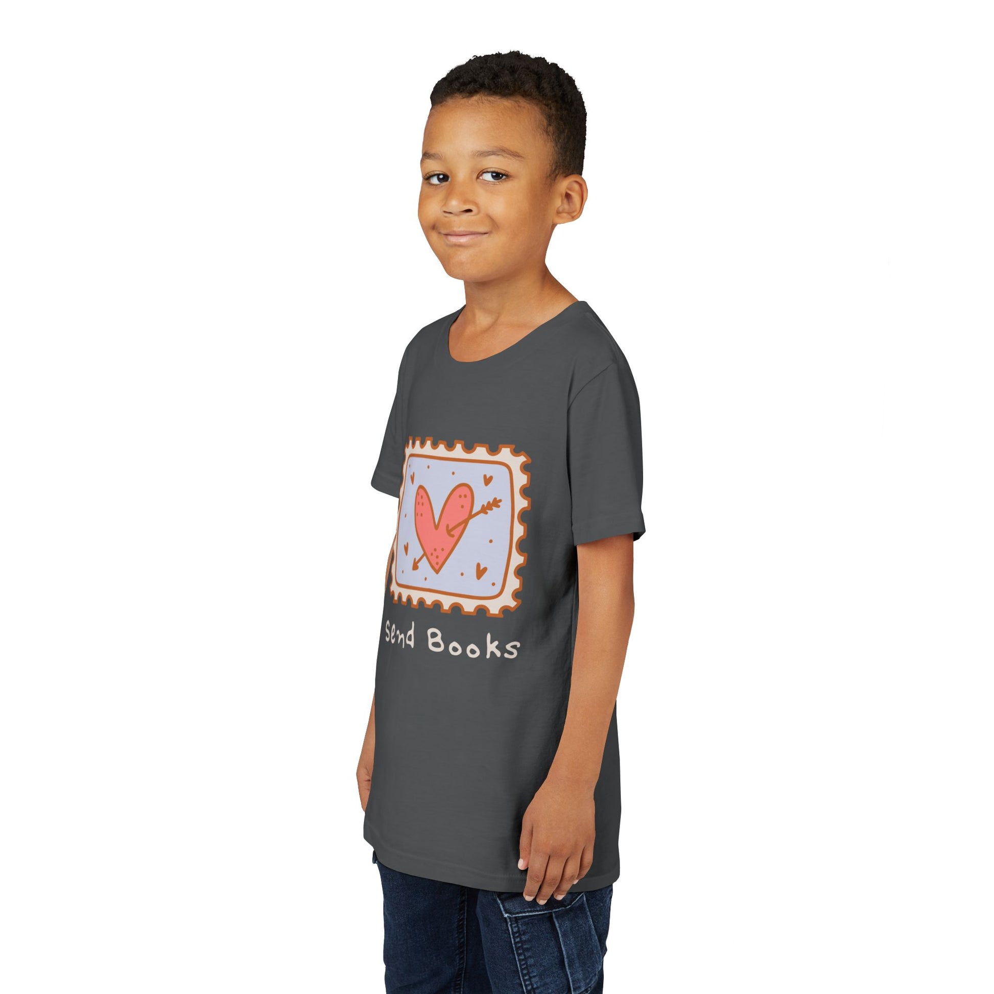 Boy wearing a dark gray t-shirt with a heart stamp and text 'Send Books'