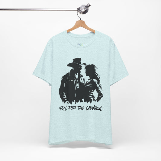 Light blue t-shirt with black graphic of a man and a woman, text says 'Fell for the Cowgirl'