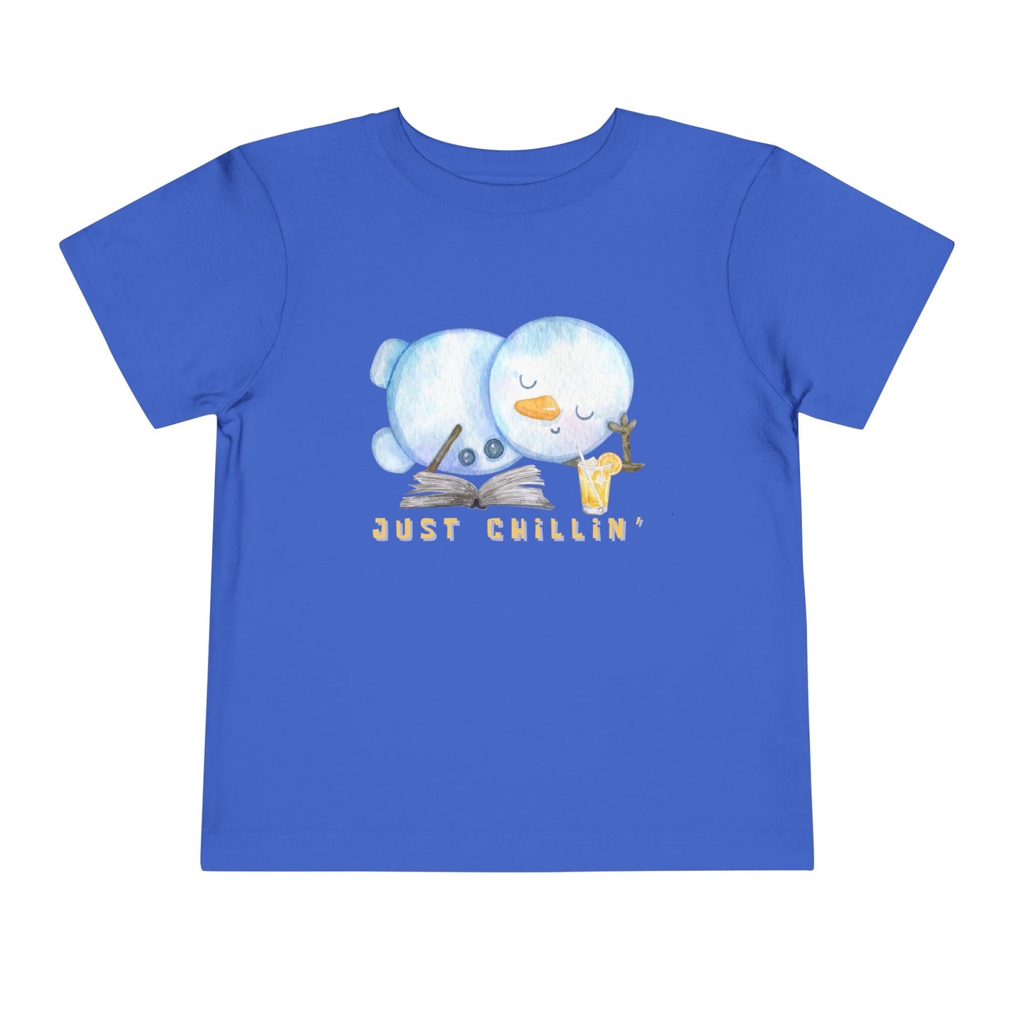 Blue toddler t-shirt with a snowman laying down with a good book and cold drink, 'Just Chillin' text on a white background