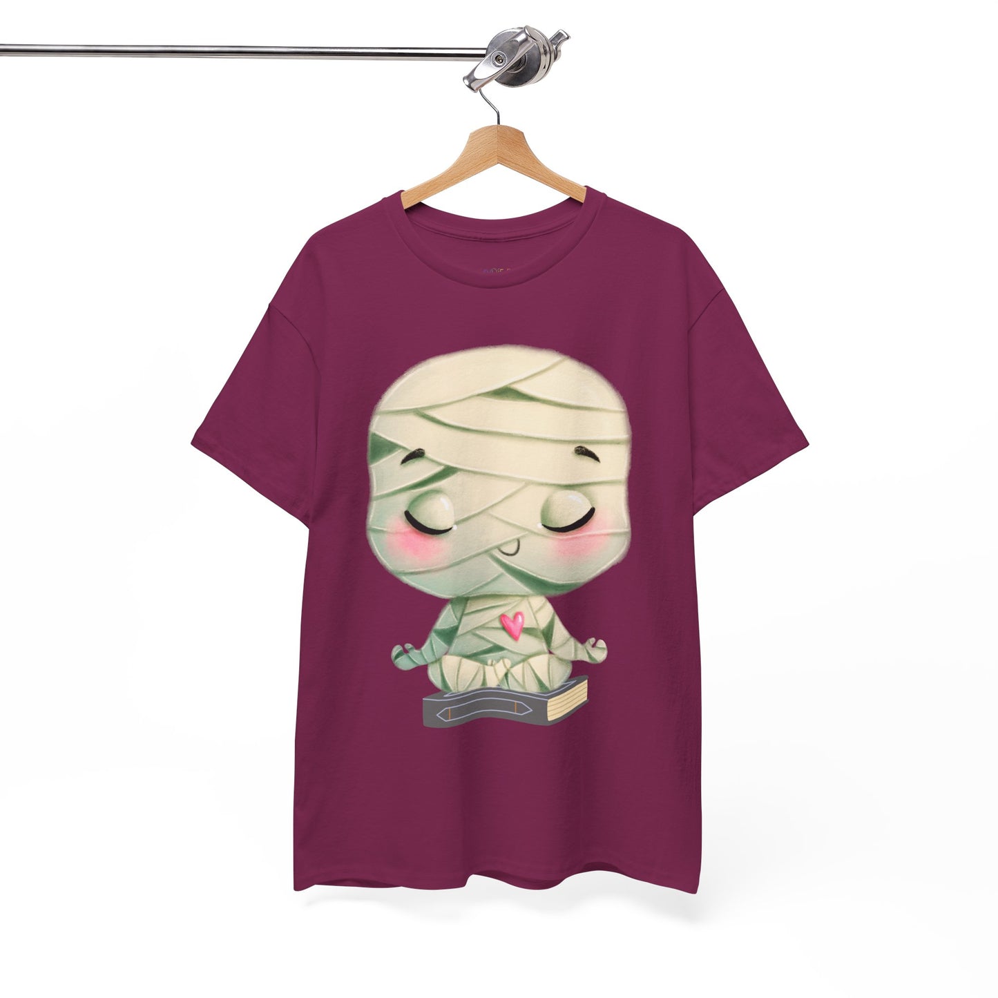 Berry t-shirt with a cartoon mummy in a meditation pose, sitting on a book