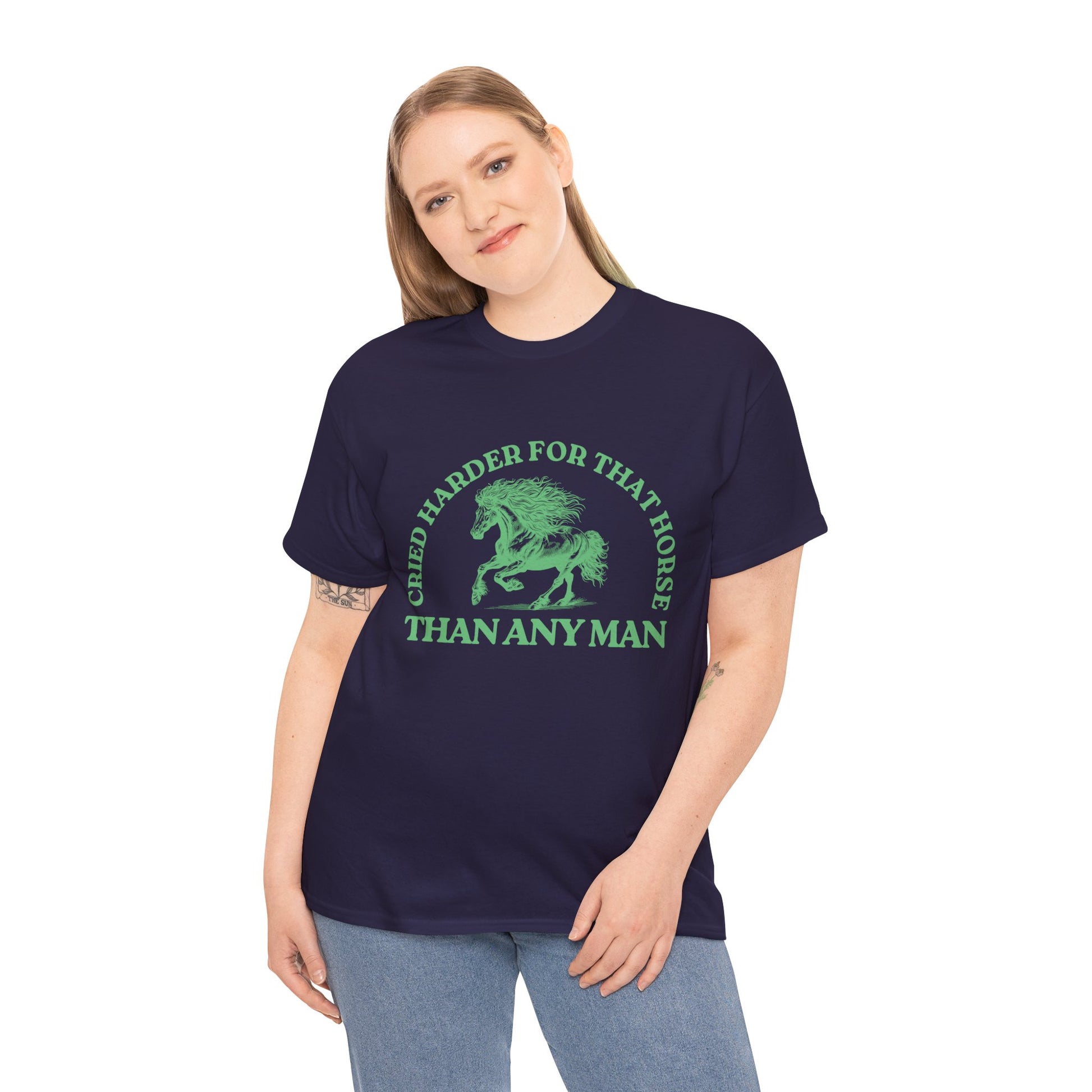 Woman wearing a navy blue t-shirt with a green running stallion and green text 'Cried Harder For That Horse Than Any Man'