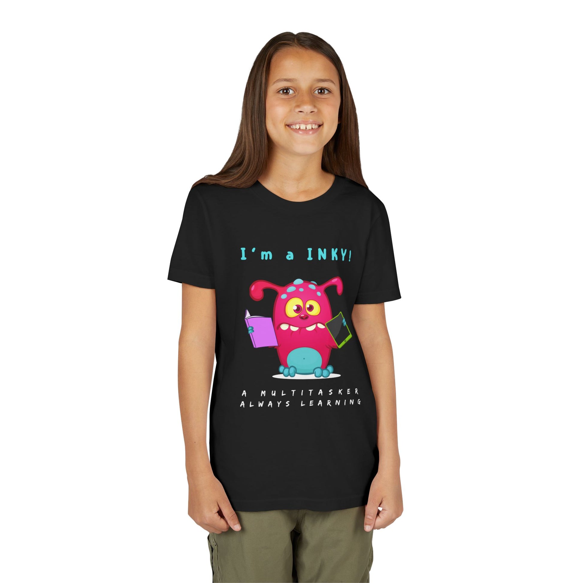 Girl wearing a black t-shirt with a colorful cartoon monster holding a book and an ipad, with text 'I'm a INKY!'