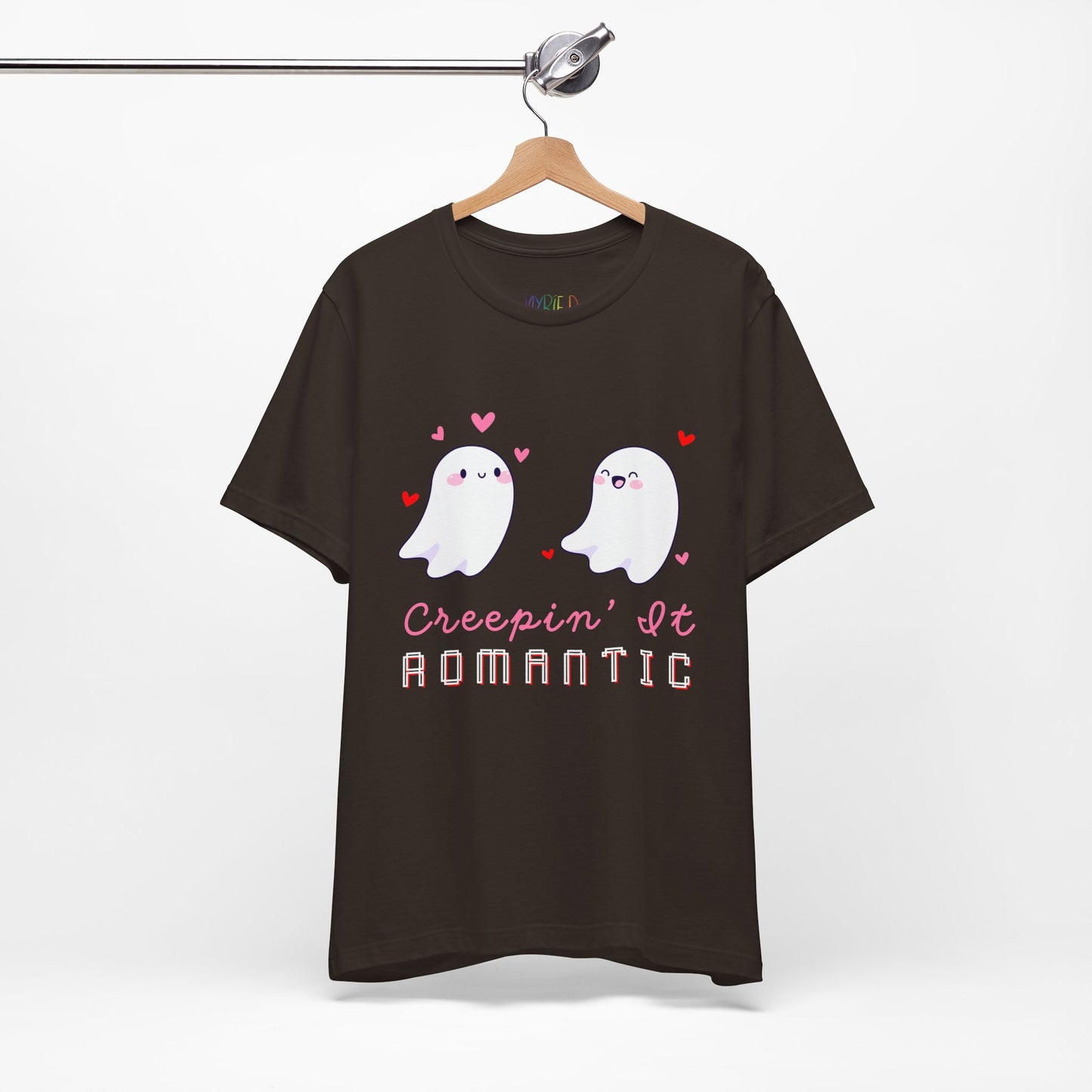 Brown t-shirt with two flirty ghosts, scattered hearts and text 'Creepin' It Romantic' 