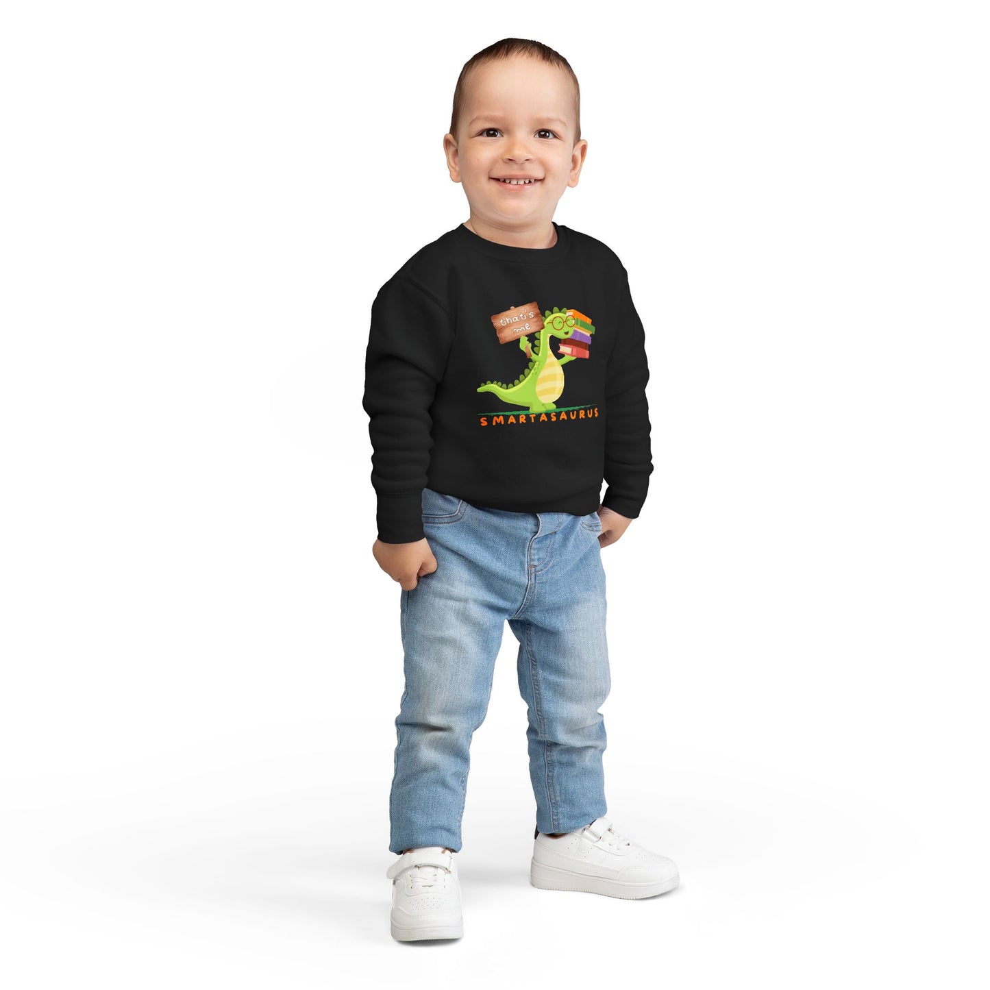 Boy wearing a black toddler sweatshirt with a smart book loving dinosaur and text 'Smartasaurus'