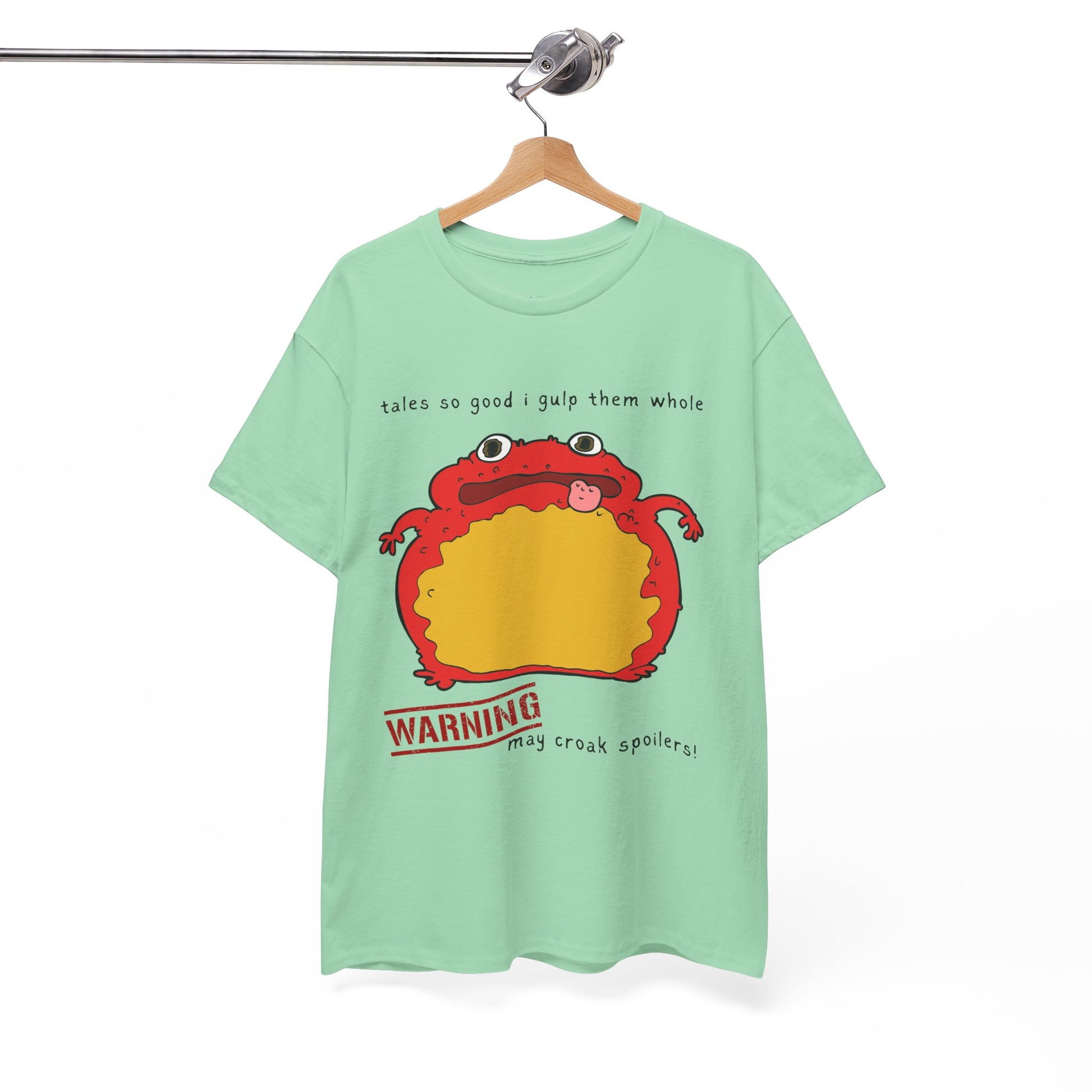 Light green t-shirt with a red toad and text 'tales so good I gulp them whole' and 'WARNING may croak spoilers'