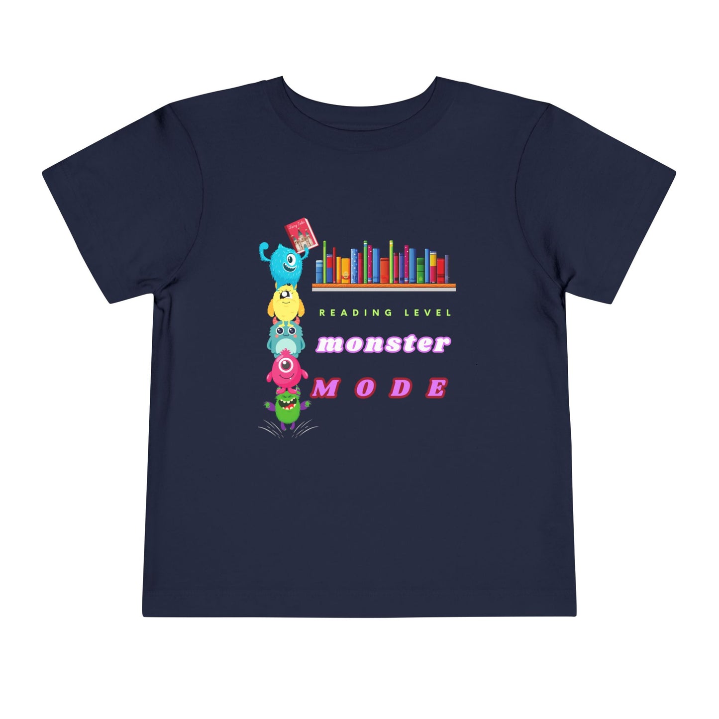 Navy blue toddler t-shirt with colorful monsters stacked on top of each other to reach a book from a bookshelf and text 'Reading Level Monster Mode'