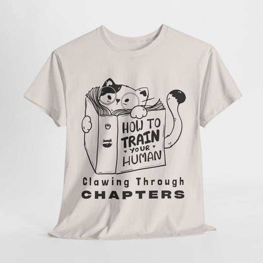 Teen/Adult Unisex “How to Train Your Human” Cat Shirt – Clawing Through Chapters Book Tee