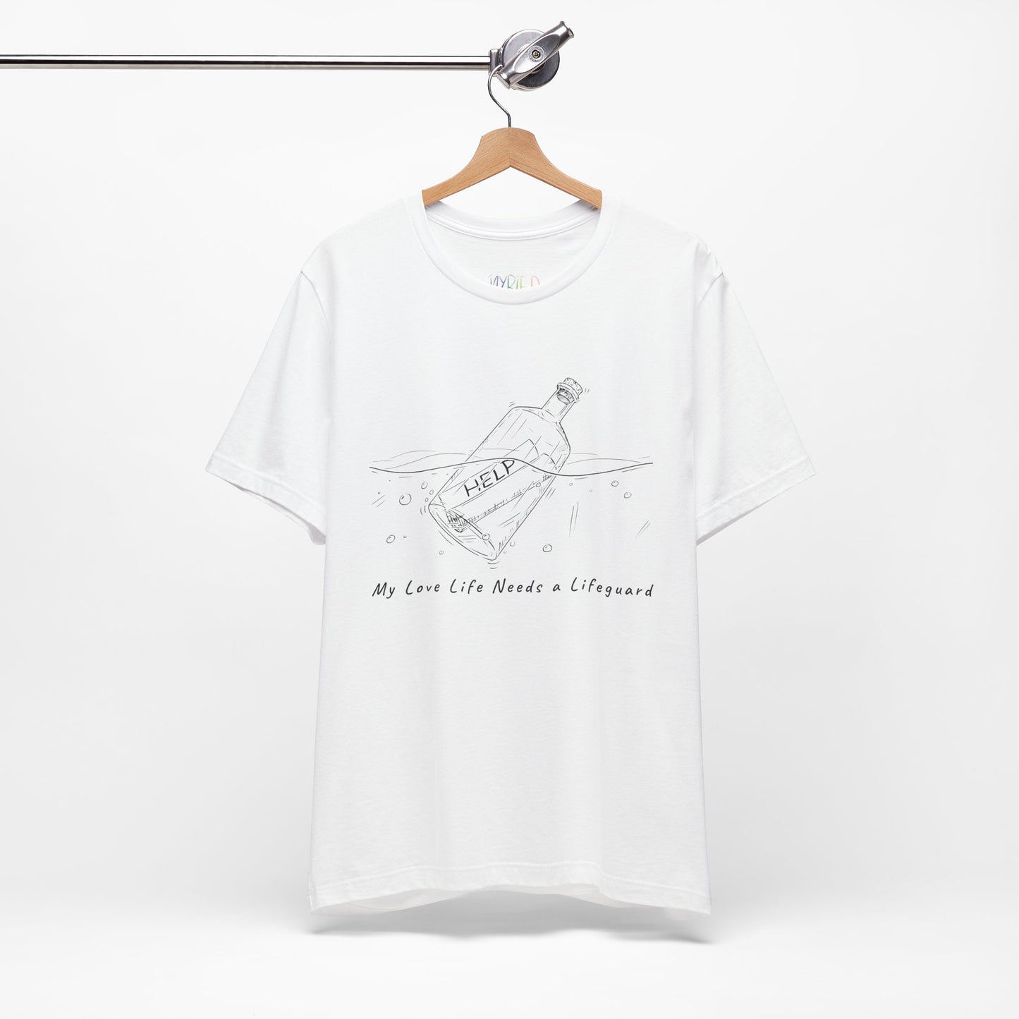 White t-shirt with white sketched image of a bottle floating in water with a rolled up paper inside that says 'help' and text below 'My Love Life Needs a Lifeguard'