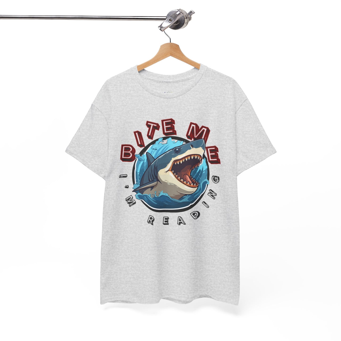 Gray t-shirt with a shark graphic bursting out of the center and text 'Bite Me I'm Reading' 