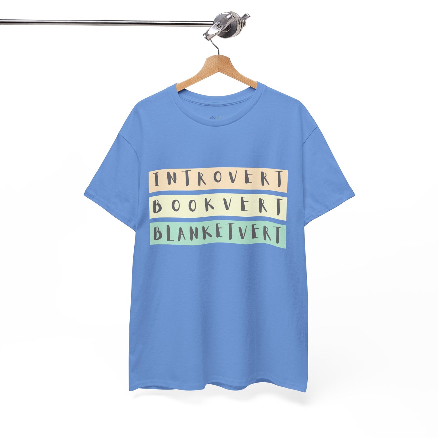 Blue t-shirt with soft colorful text 'Introvert. Bookvert. Blanketvert.'