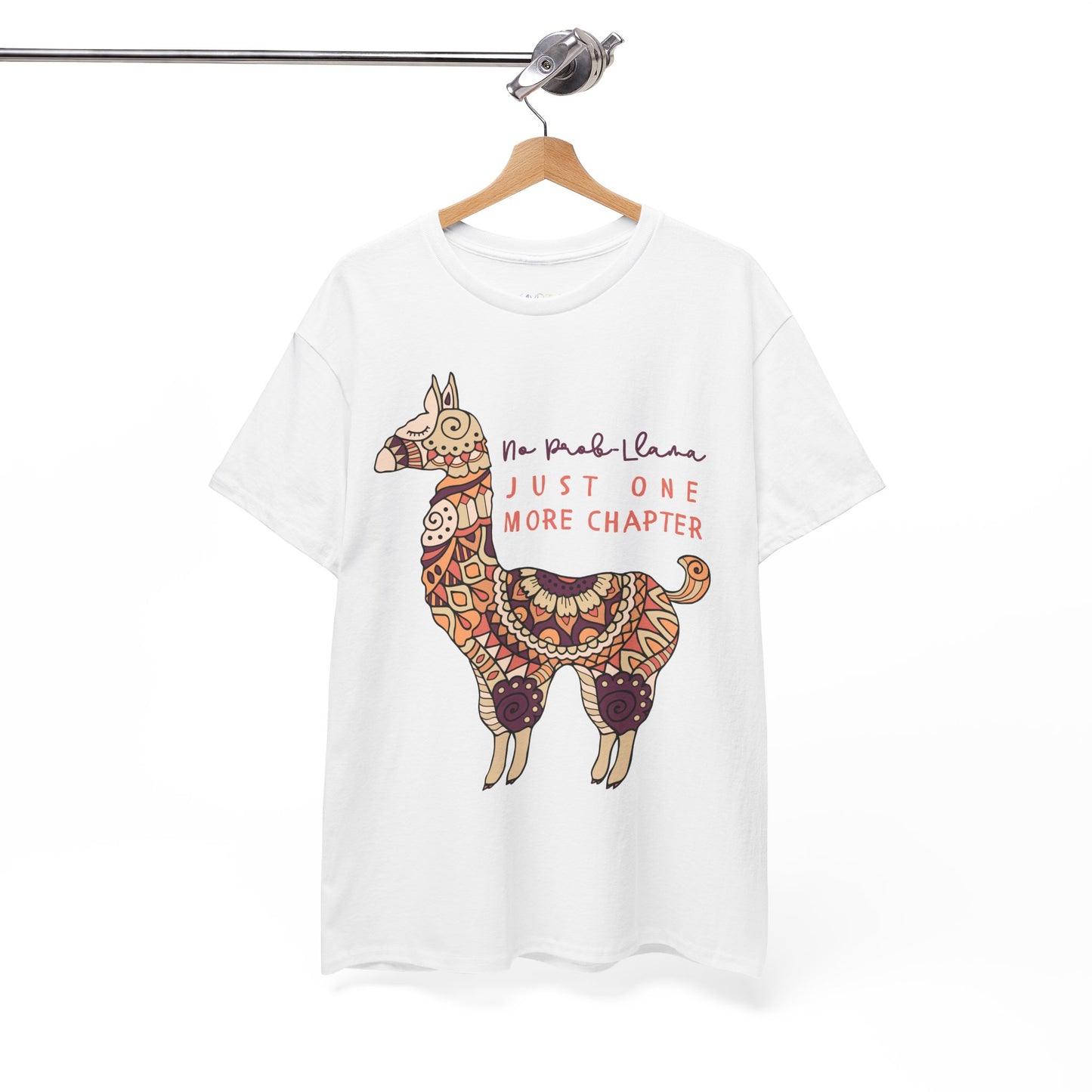 White t-shirt with a decorative llama graphic and text 'No Prob Llama, Just One More Chapter'