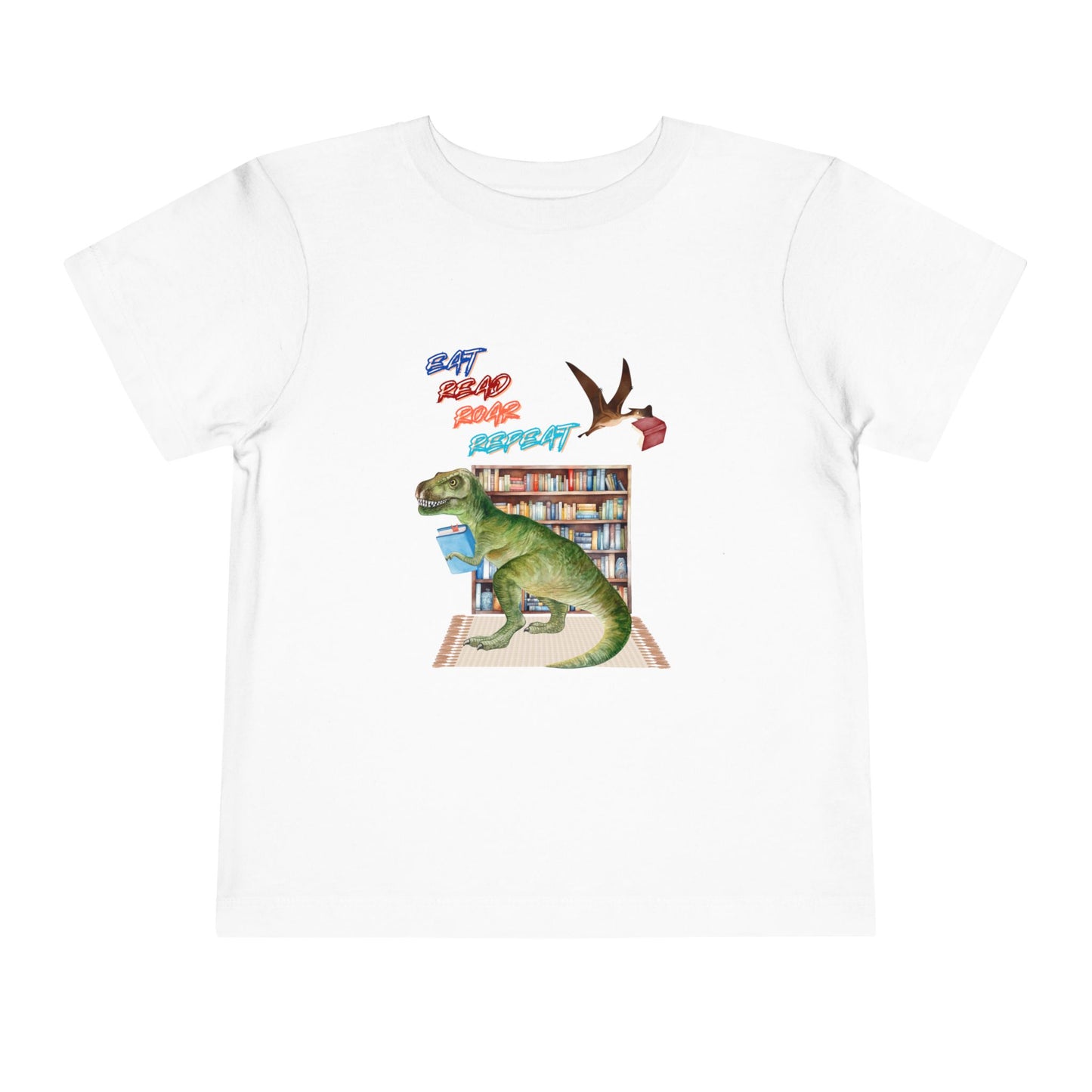 White toddler t-shirt with a t-rex dinosaur checking out a book at the library, a tera dactyl flying overhead with a book and text 'Eat, Read, Roar, Repeat' 