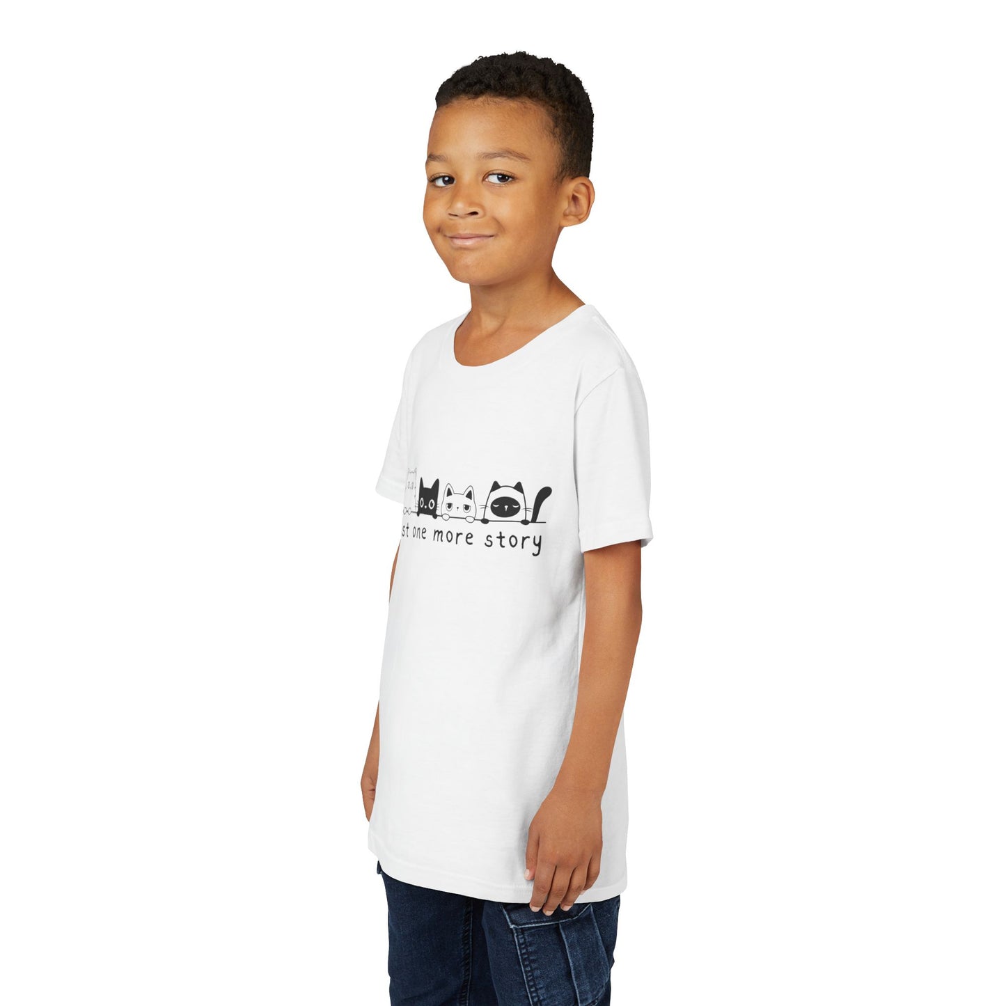 Boy wearing a white t-shirt with a row of cats peaking over a line and text 'just one more story'
