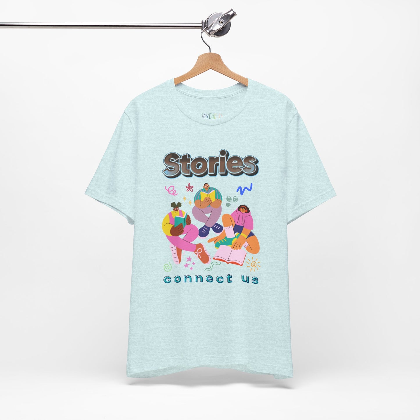 Light ice blue t-shirt with colorful modern people reading, surrounded by doodles, and text 'Stories connect us' 